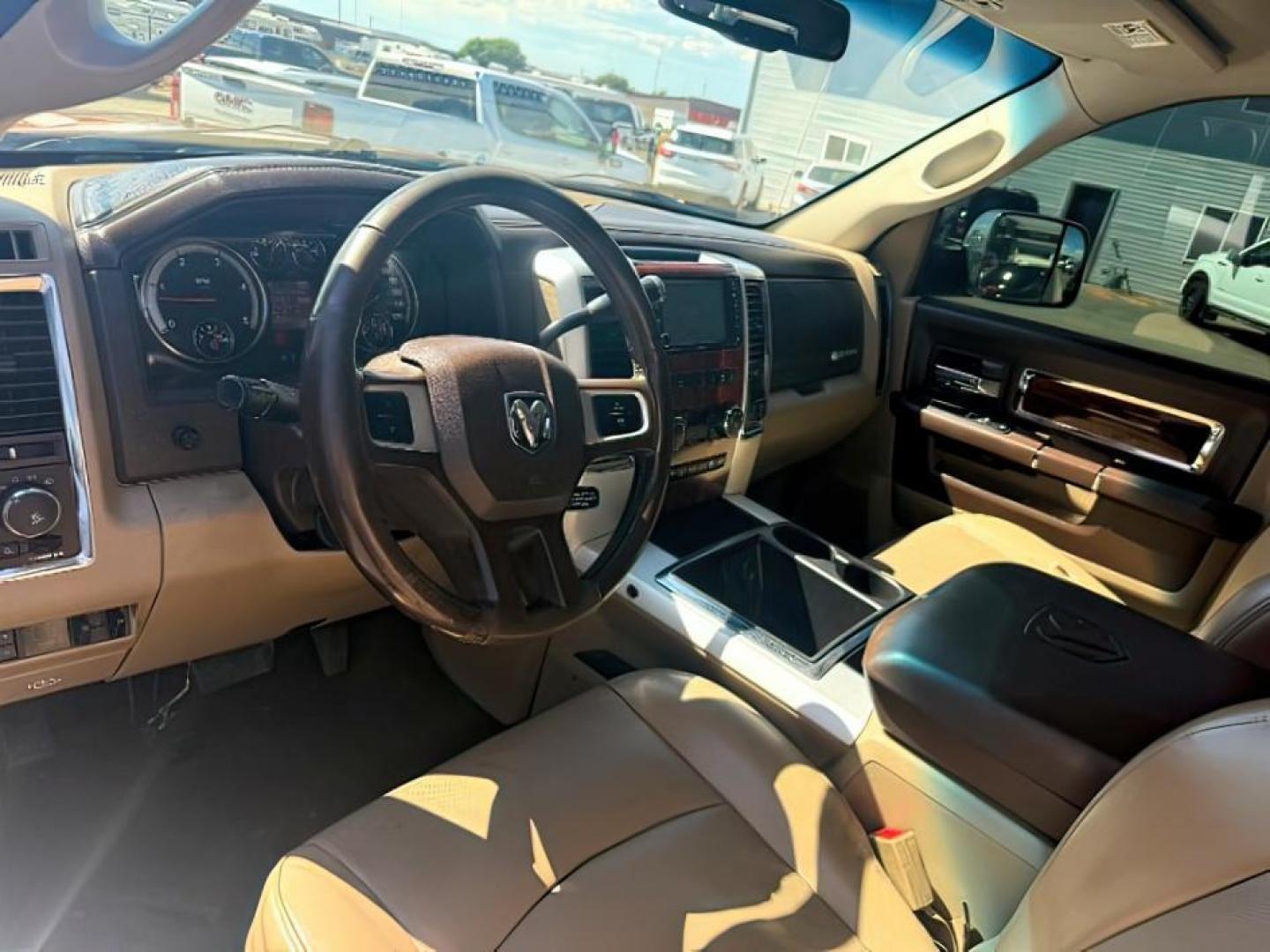 2011 MAROON /Light Pebble Beige/Bark Brown Leather Interior Dodge Ram 2500 (3D7UT2HL8BG) with an 67L L6 OHV 24V TURBO DIESEL engine, Automatic transmission, located at 1175 N Woodruff Ave, Idaho Falls, ID, 83401, 43.506901, -111.999657 - At Timberline Auto, finding a great deal on your next vehicle is always easy! Our experienced sales staff's goal is to help find you the right vehicle at the right price! Our knowledgeable finance department has options for almost any credit score. We offer extended service contract options to prote - Photo#11