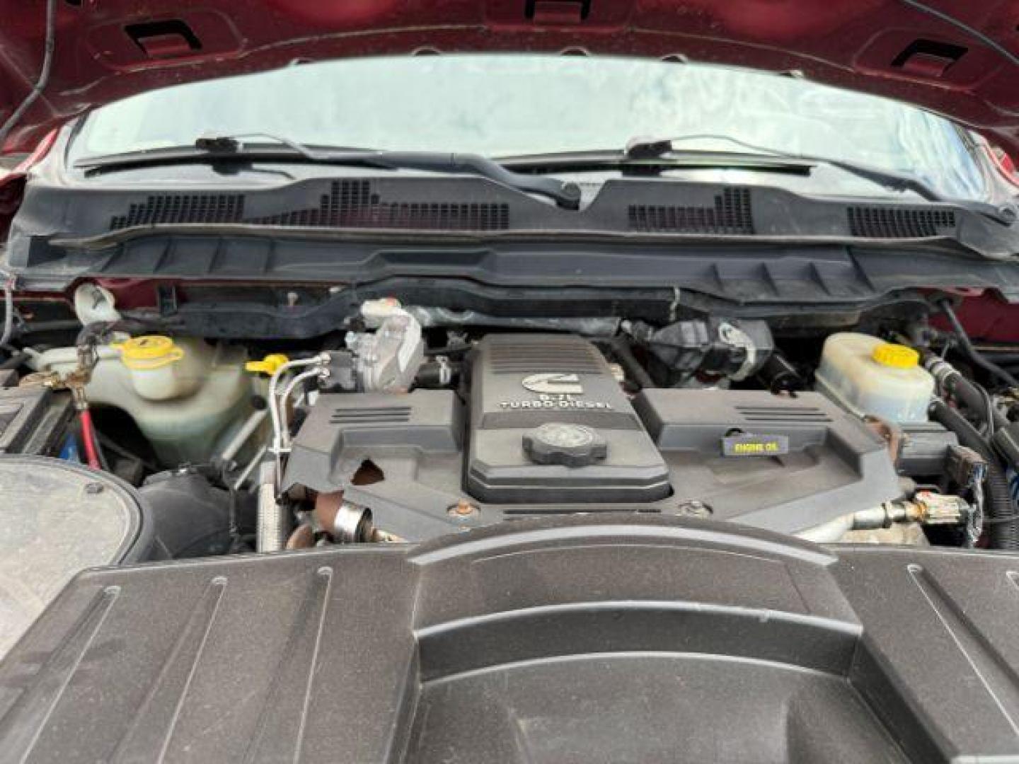 2011 MAROON /Light Pebble Beige/Bark Brown Leather Interior Dodge Ram 2500 (3D7UT2HL8BG) with an 67L L6 OHV 24V TURBO DIESEL engine, Automatic transmission, located at 1175 N Woodruff Ave, Idaho Falls, ID, 83401, 43.506901, -111.999657 - At Timberline Auto, finding a great deal on your next vehicle is always easy! Our experienced sales staff's goal is to help find you the right vehicle at the right price! Our knowledgeable finance department has options for almost any credit score. We offer extended service contract options to prote - Photo#46