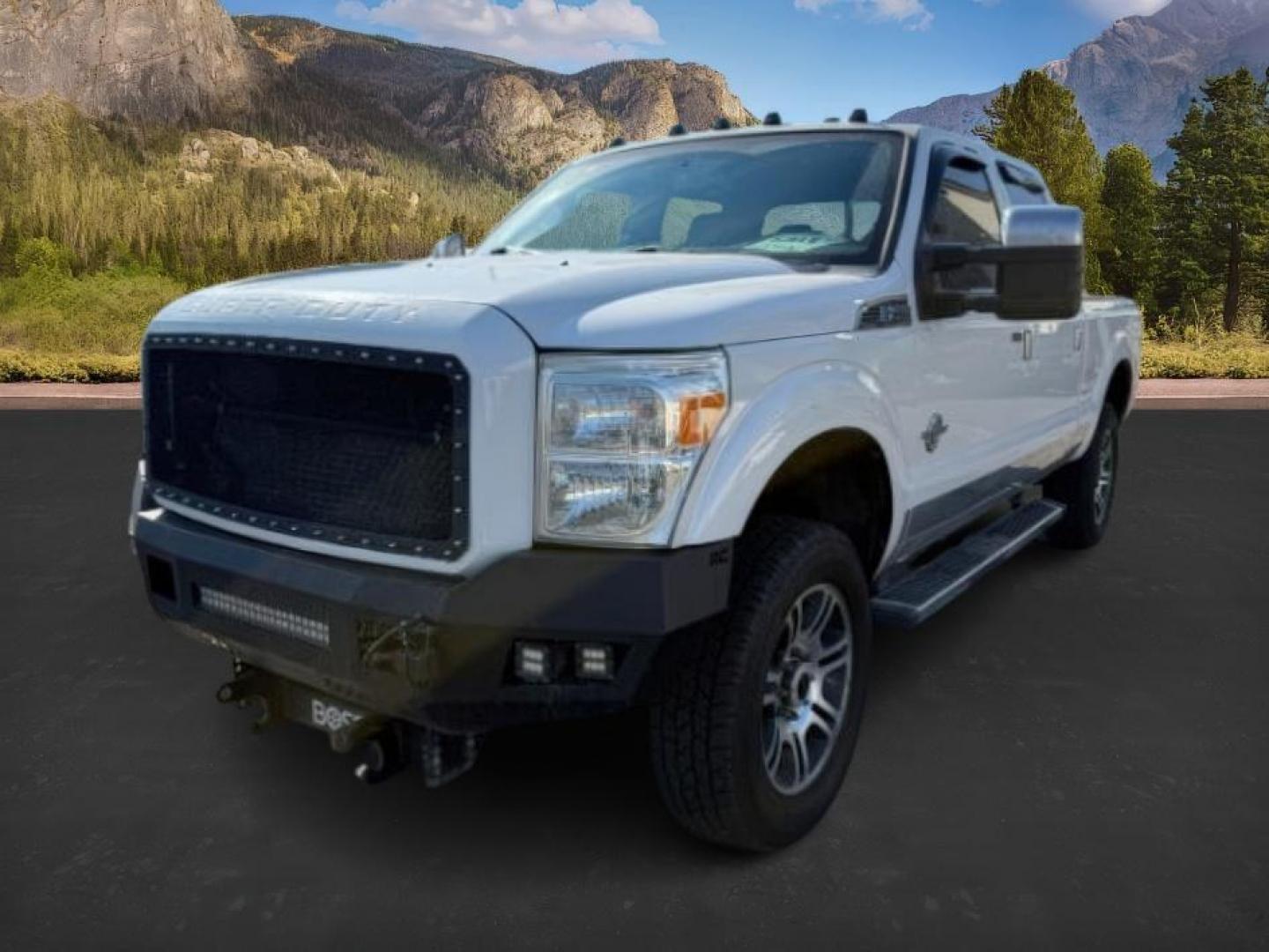 2014 WHITE /BROWN LEATHER FORD F350 PLATINUM (1FT8W3BT4EE) with an 6.7L engine, AUTOMATIC transmission, located at 1235 N Woodruff Ave., Idaho Falls, 83401, (208) 523-1053, 43.507172, -112.000488 - At Timberline Auto, finding a great deal on your next vehicle is always easy! Our experienced sales staff's goal is to help find you the right vehicle at the right price! Our knowledgeable finance department has options for almost any credit score. We offer extended service contract options to prote - Photo#0