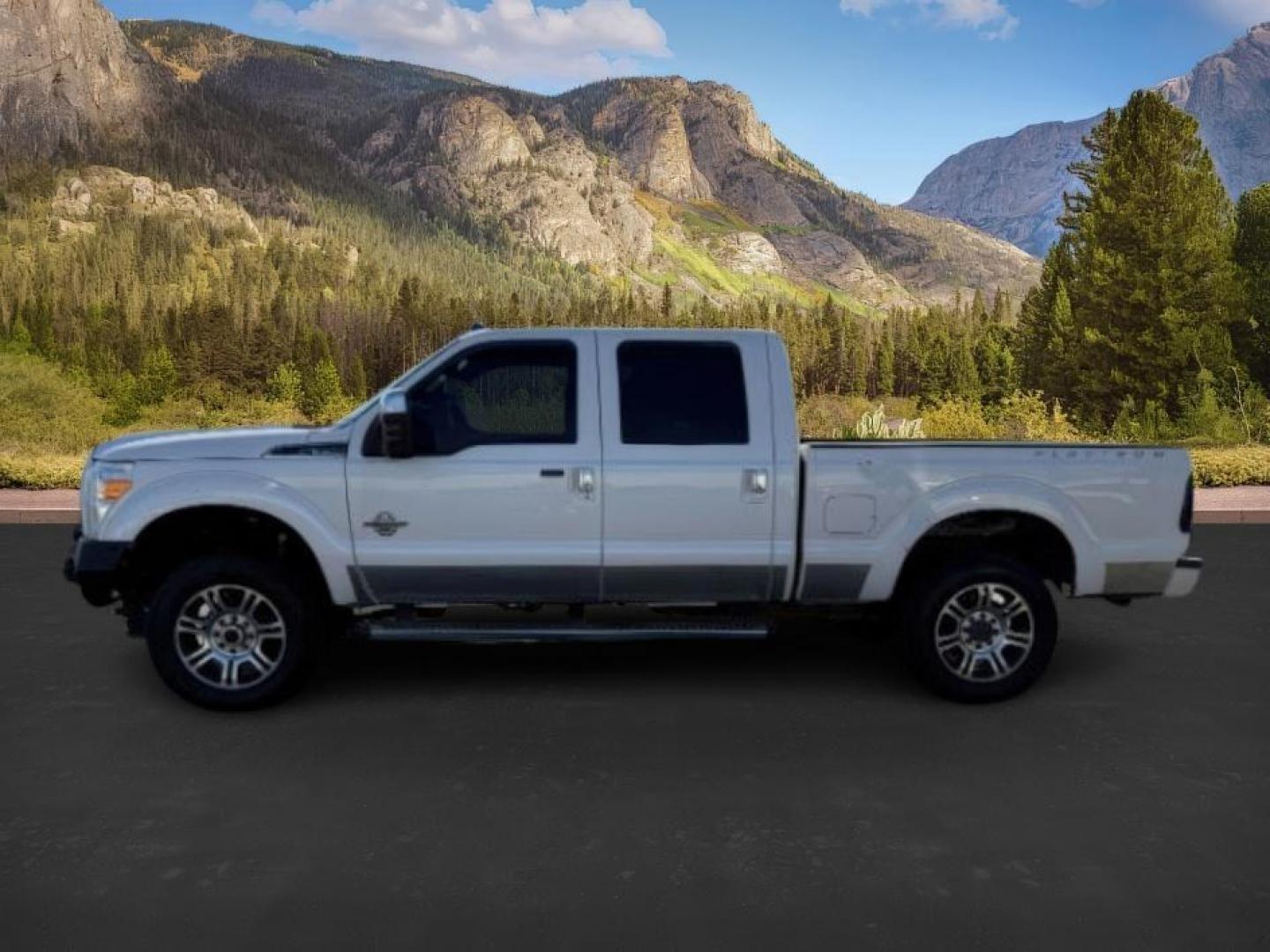 2014 WHITE /BROWN LEATHER FORD F350 PLATINUM (1FT8W3BT4EE) with an 6.7L engine, AUTOMATIC transmission, located at 1235 N Woodruff Ave., Idaho Falls, 83401, (208) 523-1053, 43.507172, -112.000488 - At Timberline Auto, finding a great deal on your next vehicle is always easy! Our experienced sales staff's goal is to help find you the right vehicle at the right price! Our knowledgeable finance department has options for almost any credit score. We offer extended service contract options to prote - Photo#1