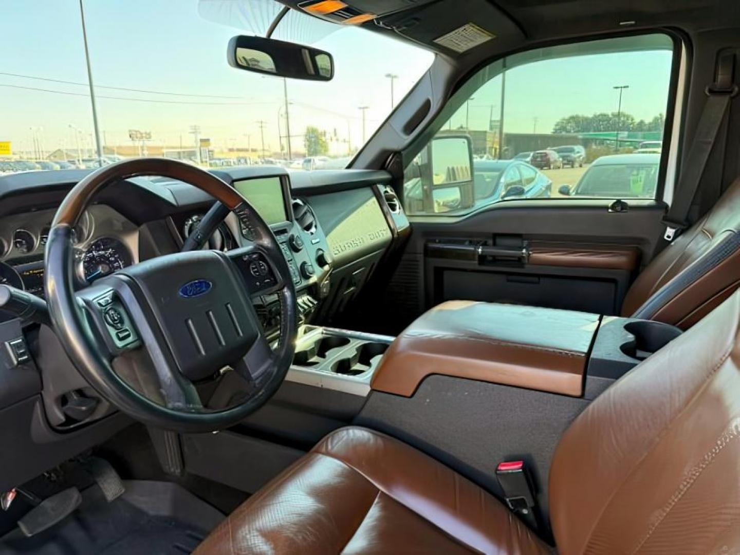 2014 WHITE /BROWN LEATHER FORD F350 PLATINUM (1FT8W3BT4EE) with an 6.7L engine, AUTOMATIC transmission, located at 1235 N Woodruff Ave., Idaho Falls, 83401, (208) 523-1053, 43.507172, -112.000488 - At Timberline Auto, finding a great deal on your next vehicle is always easy! Our experienced sales staff's goal is to help find you the right vehicle at the right price! Our knowledgeable finance department has options for almost any credit score. We offer extended service contract options to prote - Photo#10