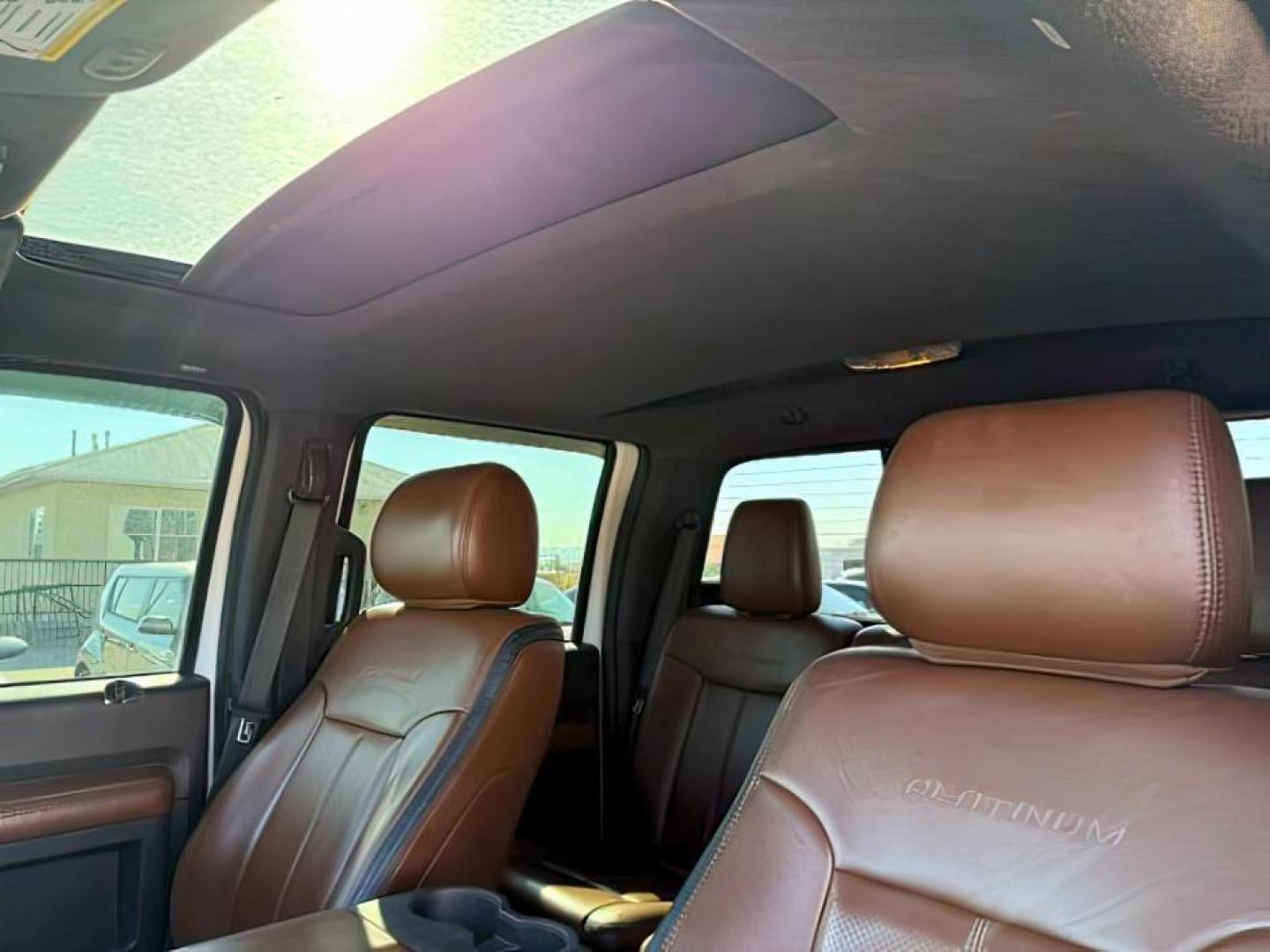 2014 WHITE /BROWN LEATHER FORD F350 PLATINUM (1FT8W3BT4EE) with an 6.7L engine, AUTOMATIC transmission, located at 1235 N Woodruff Ave., Idaho Falls, 83401, (208) 523-1053, 43.507172, -112.000488 - At Timberline Auto, finding a great deal on your next vehicle is always easy! Our experienced sales staff's goal is to help find you the right vehicle at the right price! Our knowledgeable finance department has options for almost any credit score. We offer extended service contract options to prote - Photo#14