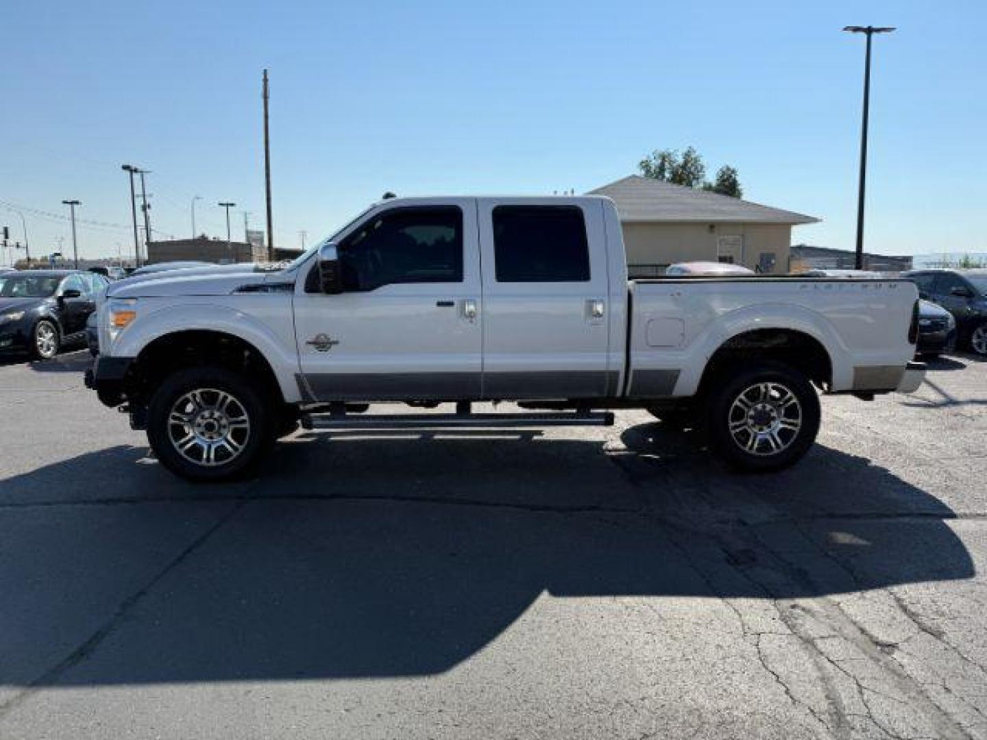 2014 WHITE /BROWN LEATHER Ford F350 (1FT8W3BT4EE) with an 67L engine, Automatic transmission, located at 1175 N Woodruff Ave, Idaho Falls, ID, 83401, 43.506901, -111.999657 - Photo#20