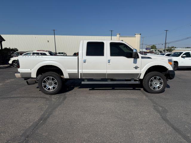 2014 WHITE /BROWN LEATHER Ford F350 (1FT8W3BT4EE) with an 67L engine, Automatic transmission, located at 1175 N Woodruff Ave, Idaho Falls, ID, 83401, 43.506901, -111.999657 - At Timberline Auto, finding a great deal on your next vehicle is always easy! Our experienced sales staff's goal is to help find you the right vehicle at the right price! Our knowledgeable finance department has options for almost any credit score. We offer extended service contract options to prote- Photo#23