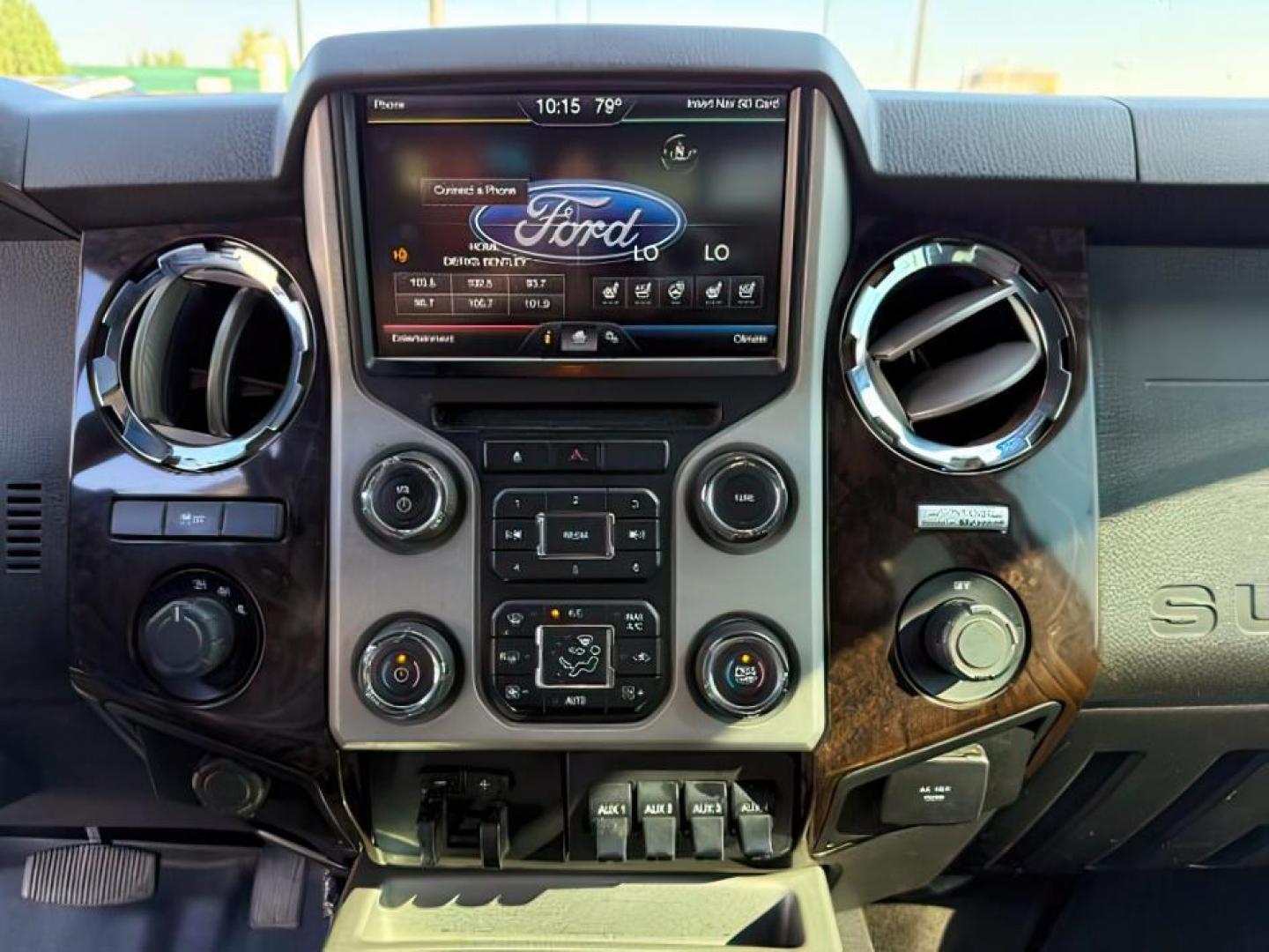 2014 WHITE /BROWN LEATHER Ford F350 (1FT8W3BT4EE) with an 67L engine, Automatic transmission, located at 1175 N Woodruff Ave, Idaho Falls, ID, 83401, 43.506901, -111.999657 - Photo#12