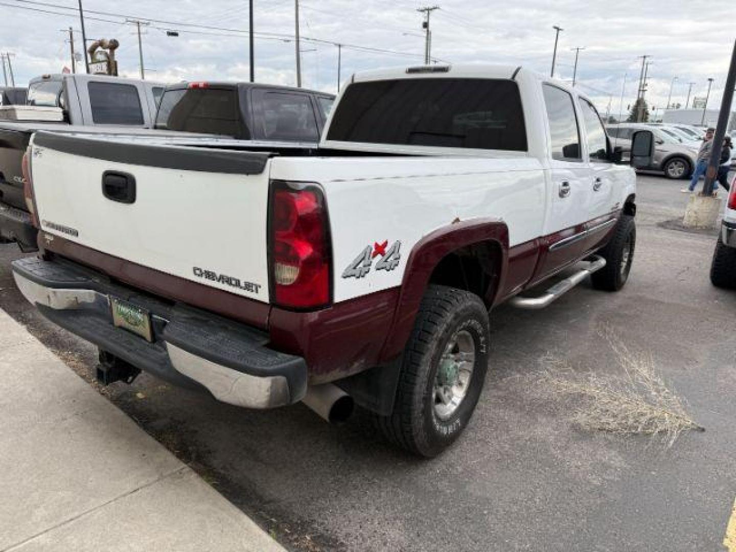 2004 Summit White /Tan Chevrolet Silverado 2500HD LS (1GCHK23144F) with an Duramax 6.6L V-8 diesel direct injection engine, AUTOMATIC transmission, located at 1235 N Woodruff Ave., Idaho Falls, 83401, (208) 523-1053, 43.507172, -112.000488 - At Timberline Auto, finding a great deal on your next vehicle is always easy! Our experienced sales staff's goal is to help find you the right vehicle at the right price! Our knowledgeable finance department has options for almost any credit score. We offer extended service contract options to prote - Photo#2