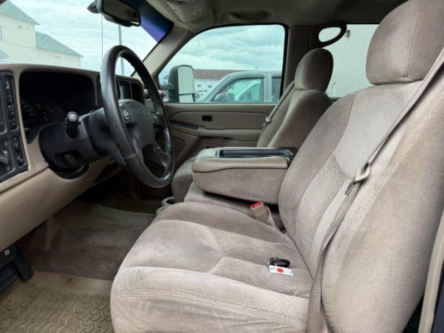 2004 Summit White /Tan Chevrolet Silverado 2500HD LS (1GCHK23144F) with an Duramax 6.6L V-8 diesel direct injection engine, AUTOMATIC transmission, located at 1235 N Woodruff Ave., Idaho Falls, 83401, (208) 523-1053, 43.507172, -112.000488 - At Timberline Auto, finding a great deal on your next vehicle is always easy! Our experienced sales staff's goal is to help find you the right vehicle at the right price! Our knowledgeable finance department has options for almost any credit score. We offer extended service contract options to prote - Photo#3