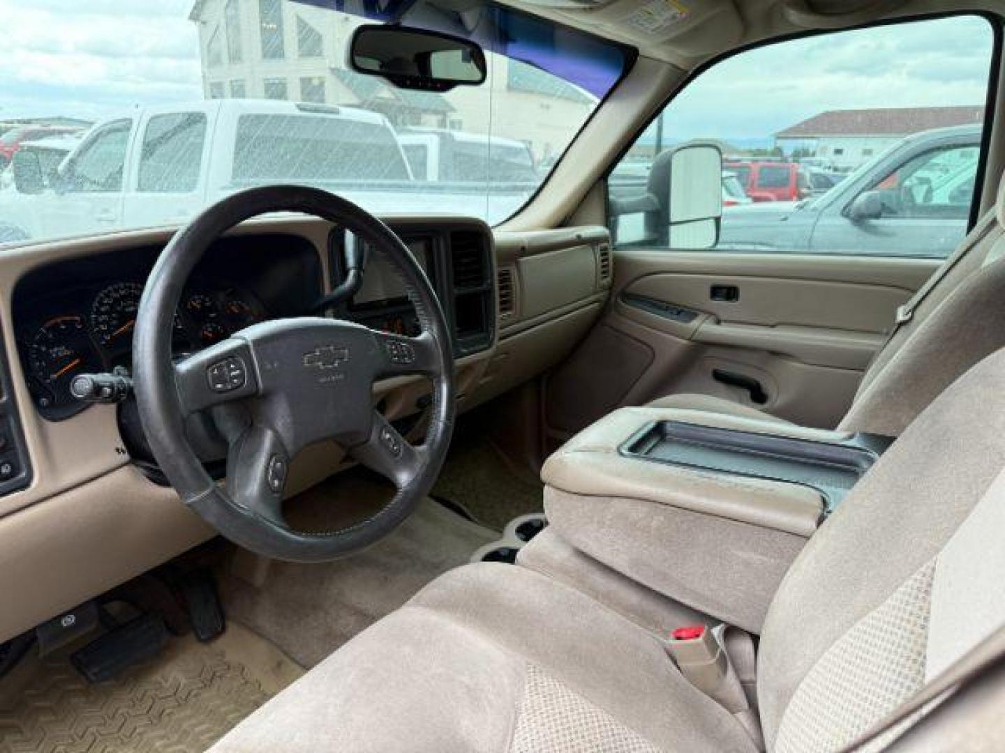 2004 Summit White /Tan Chevrolet Silverado 2500HD LS (1GCHK23144F) with an Duramax 6.6L V-8 diesel direct injection engine, AUTOMATIC transmission, located at 1235 N Woodruff Ave., Idaho Falls, 83401, (208) 523-1053, 43.507172, -112.000488 - At Timberline Auto, finding a great deal on your next vehicle is always easy! Our experienced sales staff's goal is to help find you the right vehicle at the right price! Our knowledgeable finance department has options for almost any credit score. We offer extended service contract options to prote - Photo#4
