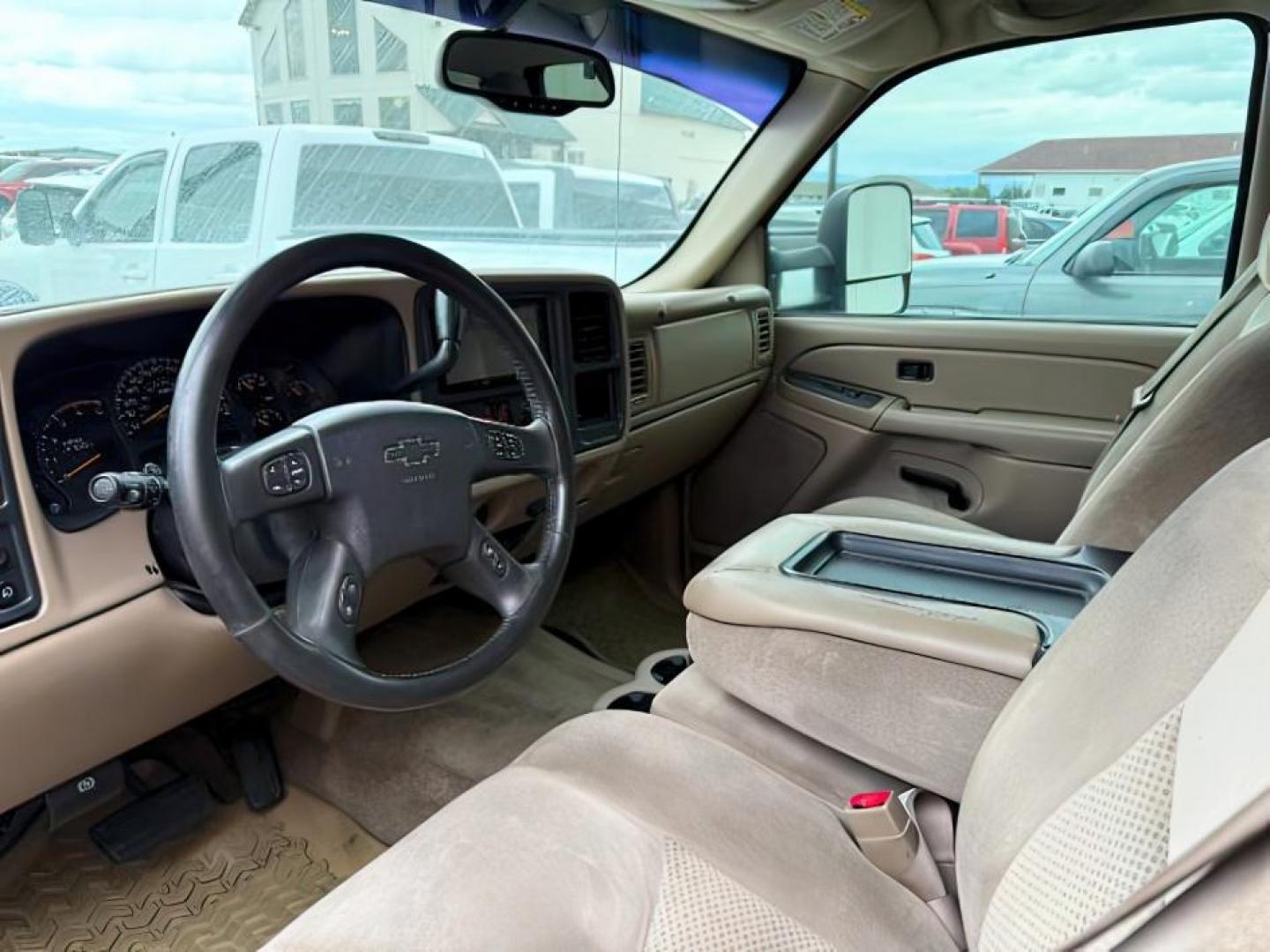 2004 Summit White /Tan Chevrolet Silverado 2500HD LS (1GCHK23144F) with an Duramax 6.6L V-8 diesel direct injection engine, AUTOMATIC transmission, located at 1235 N Woodruff Ave., Idaho Falls, 83401, (208) 523-1053, 43.507172, -112.000488 - At Timberline Auto, finding a great deal on your next vehicle is always easy! Our experienced sales staff's goal is to help find you the right vehicle at the right price! Our knowledgeable finance department has options for almost any credit score. We offer extended service contract options to prote - Photo#4