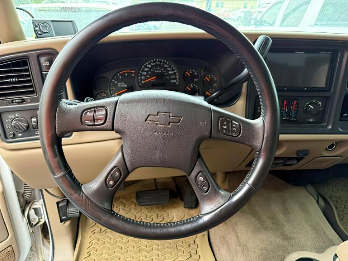 2004 Summit White /Tan Chevrolet Silverado 2500HD LS (1GCHK23144F) with an Duramax 6.6L V-8 diesel direct injection engine, AUTOMATIC transmission, located at 1235 N Woodruff Ave., Idaho Falls, 83401, (208) 523-1053, 43.507172, -112.000488 - At Timberline Auto, finding a great deal on your next vehicle is always easy! Our experienced sales staff's goal is to help find you the right vehicle at the right price! Our knowledgeable finance department has options for almost any credit score. We offer extended service contract options to prote - Photo#5