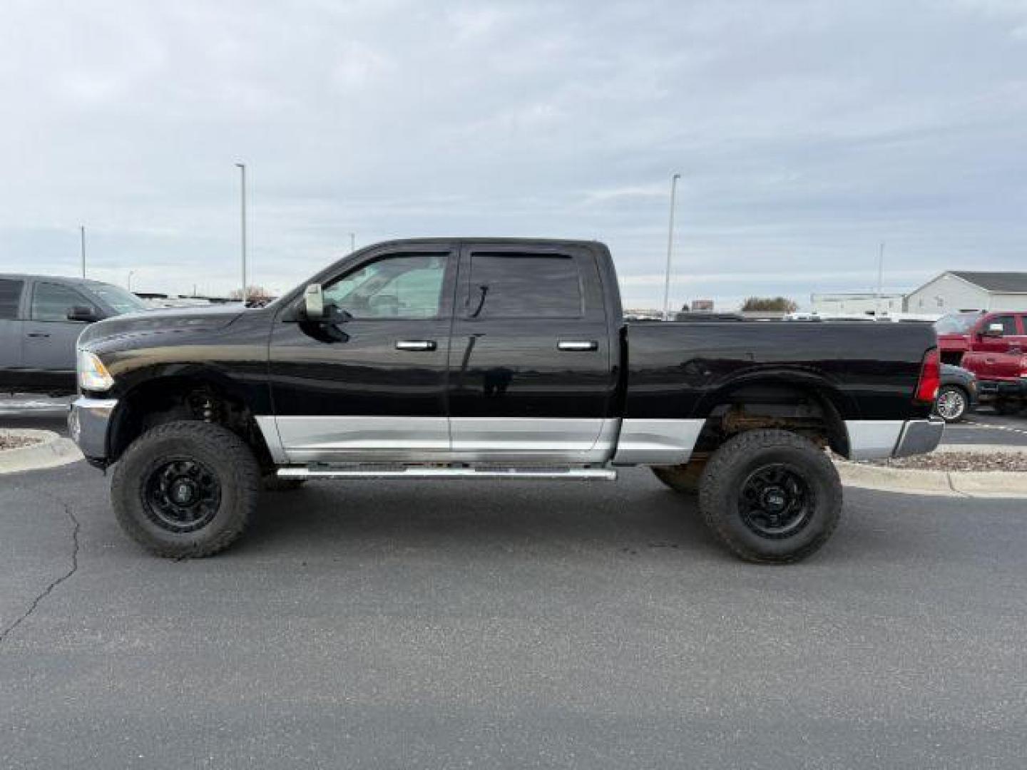 2012 BLACK /LEATHER Ram 2500 (3C6UD5FL9CG) with an 67L engine, Automatic transmission, located at 1175 N Woodruff Ave, Idaho Falls, ID, 83401, 43.506901, -111.999657 - At Timberline Auto, finding a great deal on your next vehicle is always easy! Our experienced sales staff's goal is to help find you the right vehicle at the right price! Our knowledgeable finance department has options for almost any credit score. We offer extended service contract options to prote - Photo#1