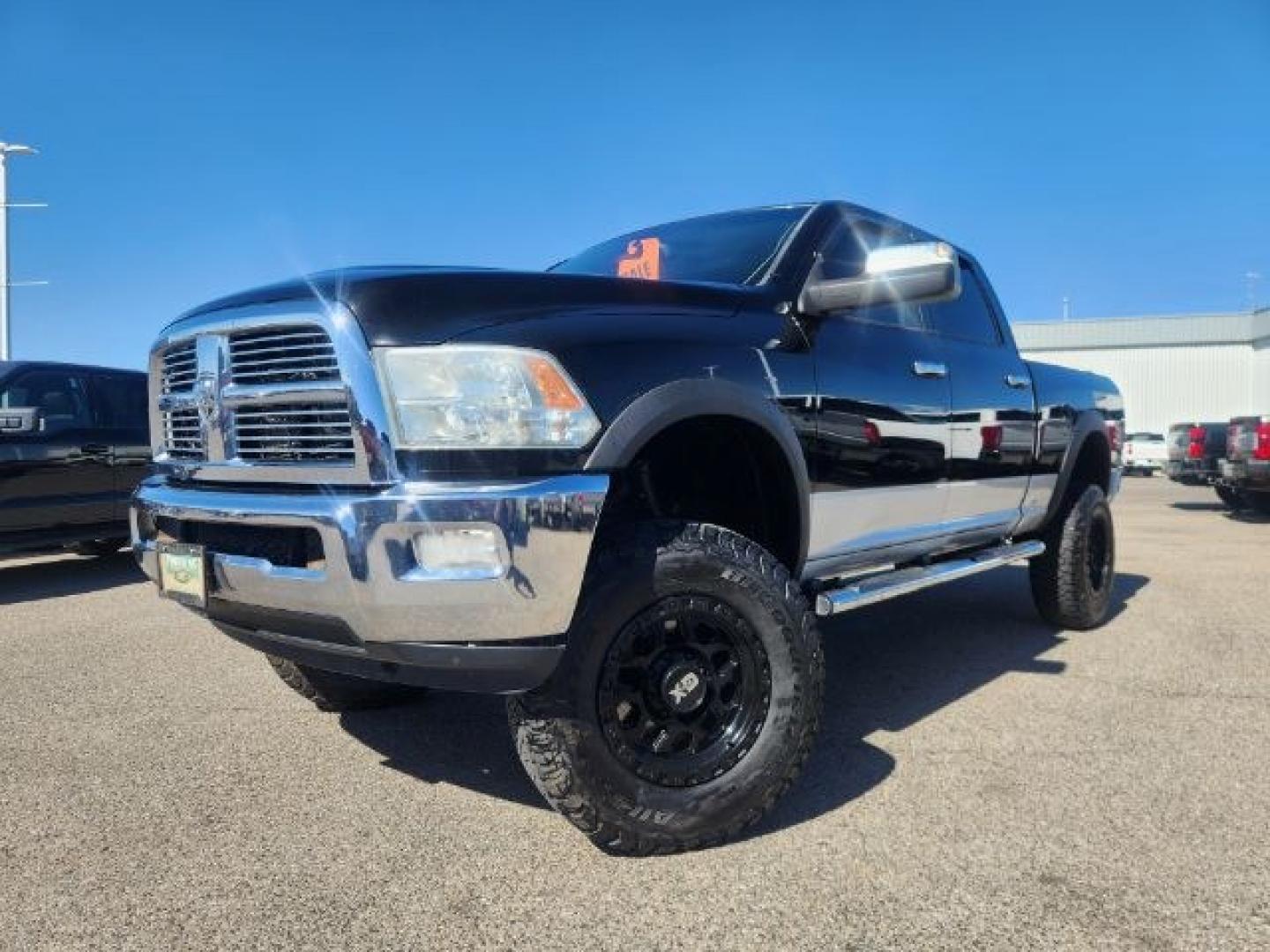 2012 BLACK /LEATHER Ram 2500 (3C6UD5FL9CG) with an 67L engine, Automatic transmission, located at 1175 N Woodruff Ave, Idaho Falls, ID, 83401, 43.506901, -111.999657 - At Timberline Auto, finding a great deal on your next vehicle is always easy! Our experienced sales staff's goal is to help find you the right vehicle at the right price! Our knowledgeable finance department has options for almost any credit score. We offer extended service contract options to prote- Photo#0