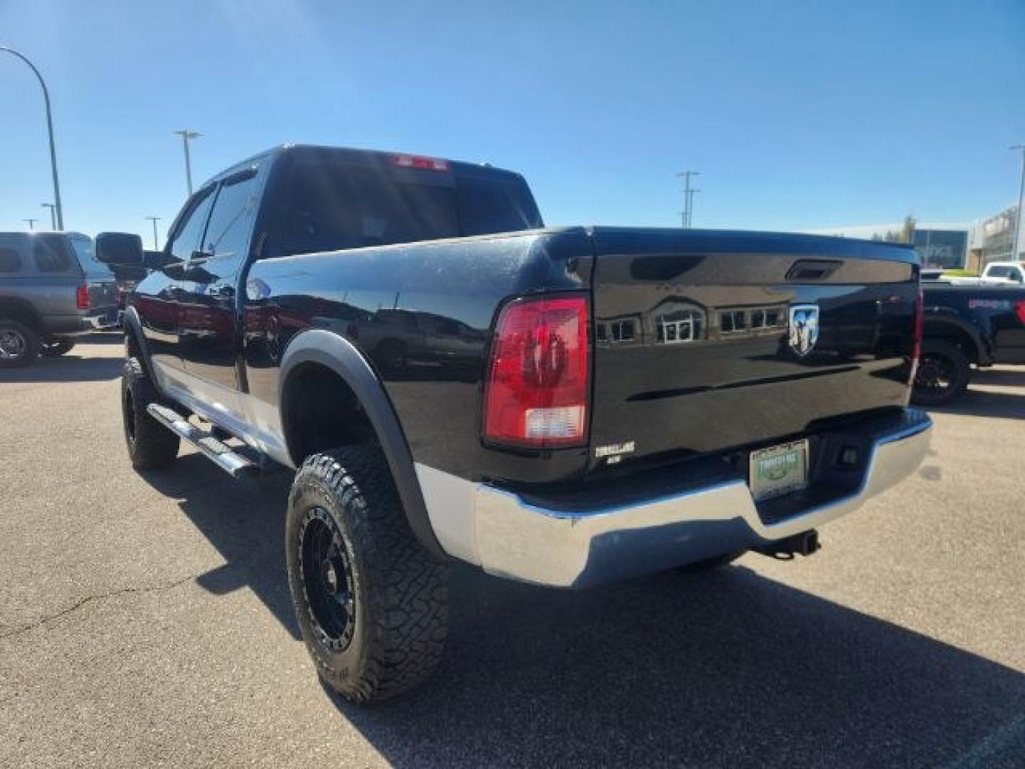 2012 BLACK /LEATHER Ram 2500 (3C6UD5FL9CG) with an 67L engine, Automatic transmission, located at 1175 N Woodruff Ave, Idaho Falls, ID, 83401, 43.506901, -111.999657 - At Timberline Auto, finding a great deal on your next vehicle is always easy! Our experienced sales staff's goal is to help find you the right vehicle at the right price! Our knowledgeable finance department has options for almost any credit score. We offer extended service contract options to prote- Photo#2