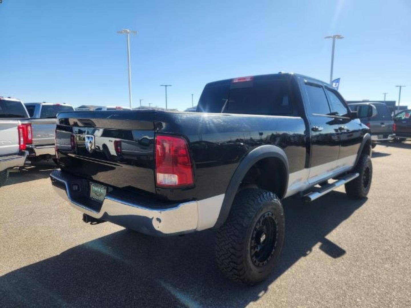 2012 BLACK /LEATHER Ram 2500 (3C6UD5FL9CG) with an 67L engine, Automatic transmission, located at 1175 N Woodruff Ave, Idaho Falls, ID, 83401, 43.506901, -111.999657 - At Timberline Auto, finding a great deal on your next vehicle is always easy! Our experienced sales staff's goal is to help find you the right vehicle at the right price! Our knowledgeable finance department has options for almost any credit score. We offer extended service contract options to prote- Photo#4