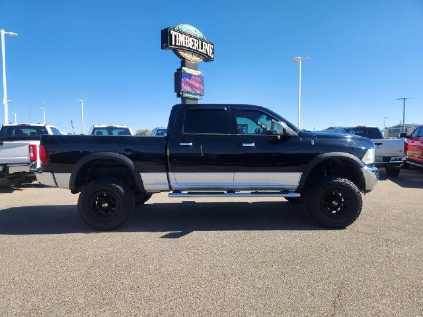 2012 BLACK /LEATHER Ram 2500 (3C6UD5FL9CG) with an 67L engine, Automatic transmission, located at 1175 N Woodruff Ave, Idaho Falls, ID, 83401, 43.506901, -111.999657 - At Timberline Auto, finding a great deal on your next vehicle is always easy! Our experienced sales staff's goal is to help find you the right vehicle at the right price! Our knowledgeable finance department has options for almost any credit score. We offer extended service contract options to prote- Photo#5