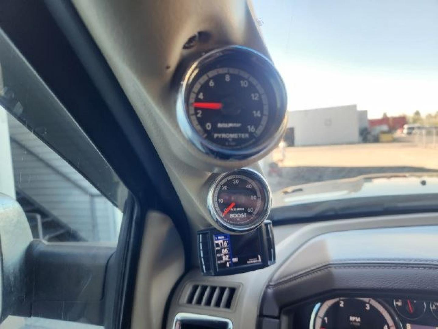 2012 BLACK /LEATHER Ram 2500 (3C6UD5FL9CG) with an 67L engine, Automatic transmission, located at 1175 N Woodruff Ave, Idaho Falls, ID, 83401, 43.506901, -111.999657 - At Timberline Auto, finding a great deal on your next vehicle is always easy! Our experienced sales staff's goal is to help find you the right vehicle at the right price! Our knowledgeable finance department has options for almost any credit score. We offer extended service contract options to prote- Photo#17