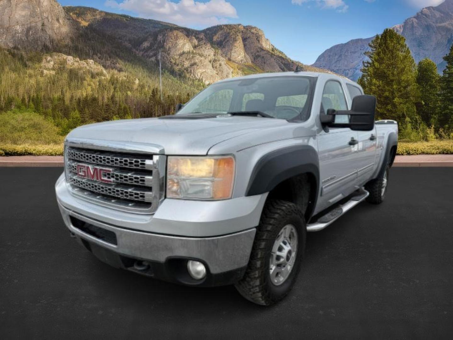 2013 SILVER /Ebony GMC Sierra 2500HD (1GT120CG5DF) with an Vortec 6L V-8 variable valve control engine, Automatic transmission, located at 1175 N Woodruff Ave, Idaho Falls, ID, 83401, 43.506901, -111.999657 - At Timberline Auto, finding a great deal on your next vehicle is always easy! Our experienced sales staff's goal is to help find you the right vehicle at the right price! Our knowledgeable finance department has options for almost any credit score. We offer extended service contract options to prote - Photo#0