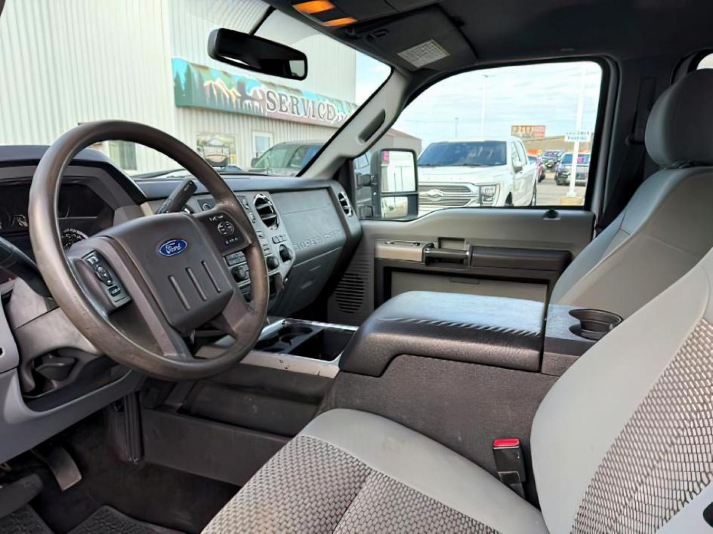 2014 SILVER /CLOTH FORD F250 SUPER DUTY XLT (1FT7W2BT0EE) with an 6.7L engine, AUTOMATIC transmission, located at 1235 N Woodruff Ave., Idaho Falls, 83401, (208) 523-1053, 43.507172, -112.000488 - At Timberline Auto, finding a great deal on your next vehicle is always easy! Our experienced sales staff's goal is to help find you the right vehicle at the right price! Our knowledgeable finance department has options for almost any credit score. We offer extended service contract options to prote - Photo#12