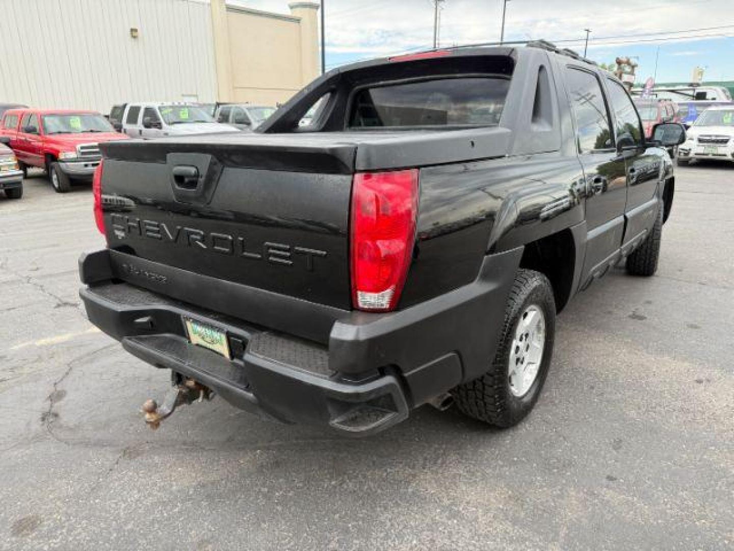 2003 BLACK /LEATHER Chevrolet Avalanche 1500 (3GNEK13T23G) with an 53 engine, Automatic transmission, located at 1175 N Woodruff Ave, Idaho Falls, ID, 83401, 43.506901, -111.999657 - At Timberline Auto, finding a great deal on your next vehicle is always easy! Our experienced sales staff's goal is to help find you the right vehicle at the right price! Our knowledgeable finance department has options for almost any credit score. We offer extended service contract options to prote - Photo#22