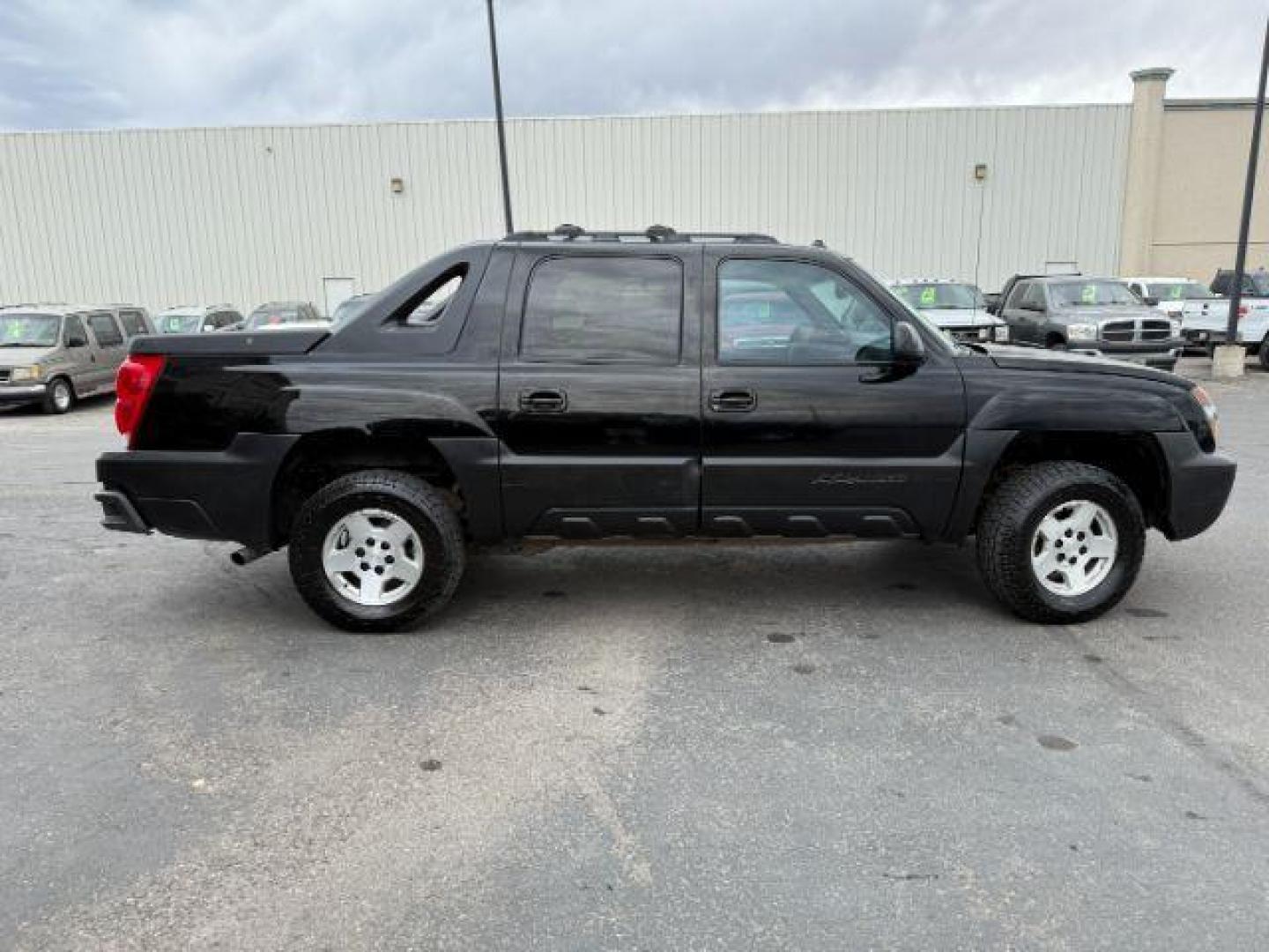 2003 BLACK /LEATHER Chevrolet Avalanche 1500 (3GNEK13T23G) with an 53 engine, Automatic transmission, located at 1175 N Woodruff Ave, Idaho Falls, ID, 83401, 43.506901, -111.999657 - At Timberline Auto, finding a great deal on your next vehicle is always easy! Our experienced sales staff's goal is to help find you the right vehicle at the right price! Our knowledgeable finance department has options for almost any credit score. We offer extended service contract options to prote - Photo#23