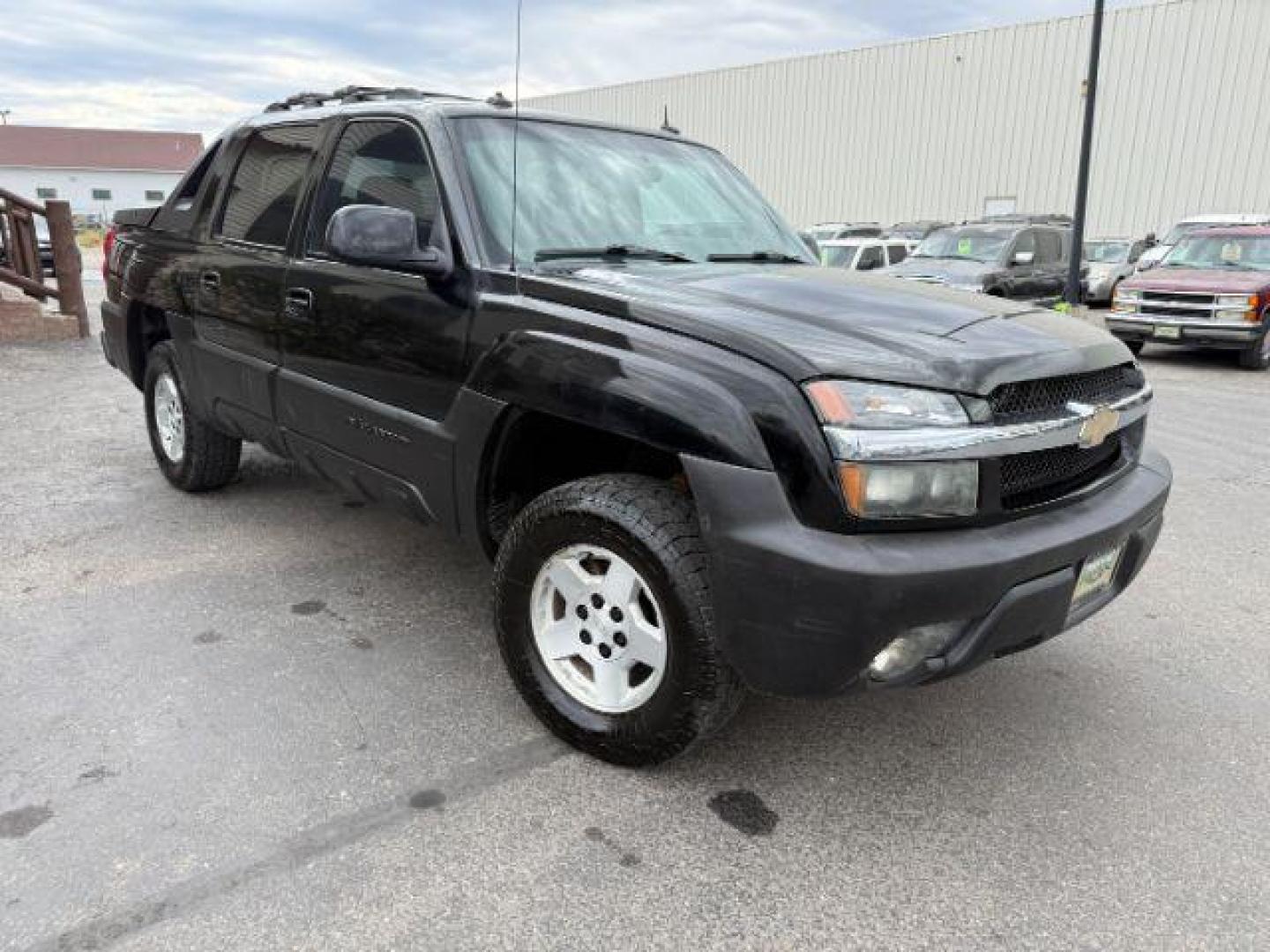 2003 BLACK /LEATHER Chevrolet Avalanche 1500 (3GNEK13T23G) with an 53 engine, Automatic transmission, located at 1175 N Woodruff Ave, Idaho Falls, ID, 83401, 43.506901, -111.999657 - At Timberline Auto, finding a great deal on your next vehicle is always easy! Our experienced sales staff's goal is to help find you the right vehicle at the right price! Our knowledgeable finance department has options for almost any credit score. We offer extended service contract options to prote - Photo#24