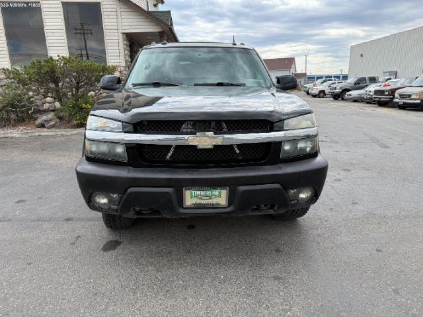 2003 BLACK /LEATHER Chevrolet Avalanche 1500 (3GNEK13T23G) with an 53 engine, Automatic transmission, located at 1175 N Woodruff Ave, Idaho Falls, ID, 83401, 43.506901, -111.999657 - At Timberline Auto, finding a great deal on your next vehicle is always easy! Our experienced sales staff's goal is to help find you the right vehicle at the right price! Our knowledgeable finance department has options for almost any credit score. We offer extended service contract options to prote - Photo#25