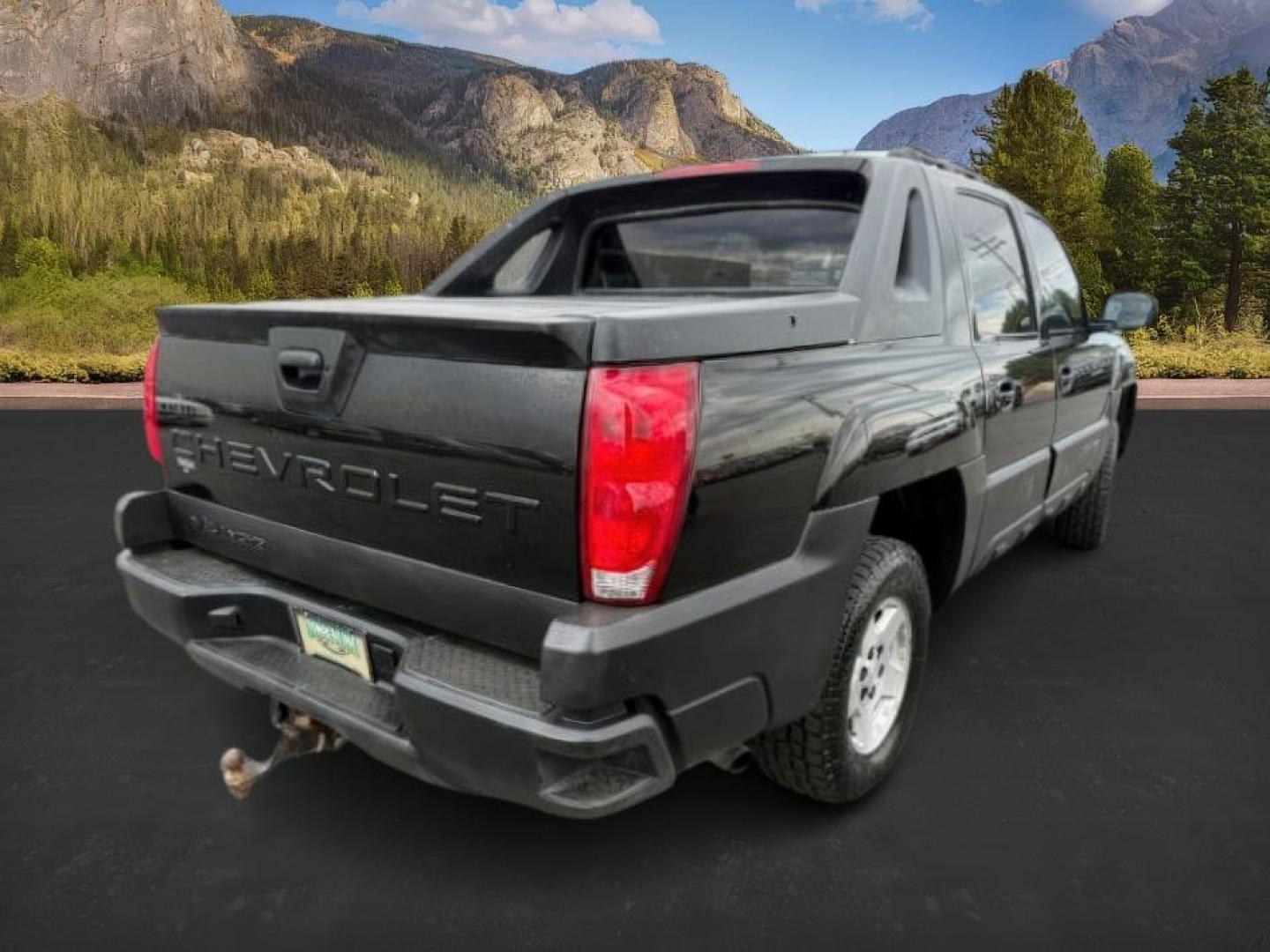 2003 BLACK /LEATHER Chevrolet Avalanche 1500 (3GNEK13T23G) with an 53 engine, Automatic transmission, located at 1175 N Woodruff Ave, Idaho Falls, ID, 83401, 43.506901, -111.999657 - At Timberline Auto, finding a great deal on your next vehicle is always easy! Our experienced sales staff's goal is to help find you the right vehicle at the right price! Our knowledgeable finance department has options for almost any credit score. We offer extended service contract options to prote - Photo#3