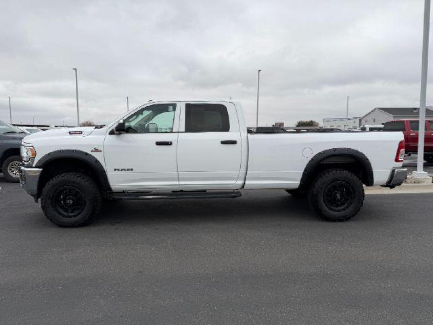 2019 Bright White Clearcoat /Diesel Gray/Black Ram 3500 (3C63R3GL9KG) with an Cummins 67L I-6 diesel direct injection engine, Automatic transmission, located at 1175 N Woodruff Ave, Idaho Falls, ID, 83401, 43.506901, -111.999657 - At Timberline Auto, finding a great deal on your next vehicle is always easy! Our experienced sales staff's goal is to help find you the right vehicle at the right price! Our knowledgeable finance department has options for almost any credit score. We offer extended service contract options to prote - Photo#1
