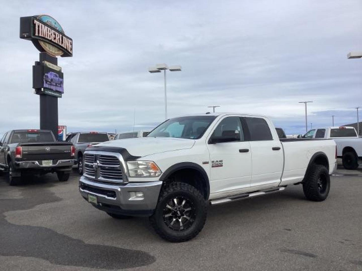 2013 Bright White Clearcoat /Diesel Gray/Black RAM 2500 SLT Crew Cab LWB 4WD (3C6TR5JT9DG) with an 5.7L V8 OHV 16V engine, 6-Speed Automatic transmission, located at 1235 N Woodruff Ave., Idaho Falls, 83401, (208) 523-1053, 43.507172, -112.000488 - Photo#0