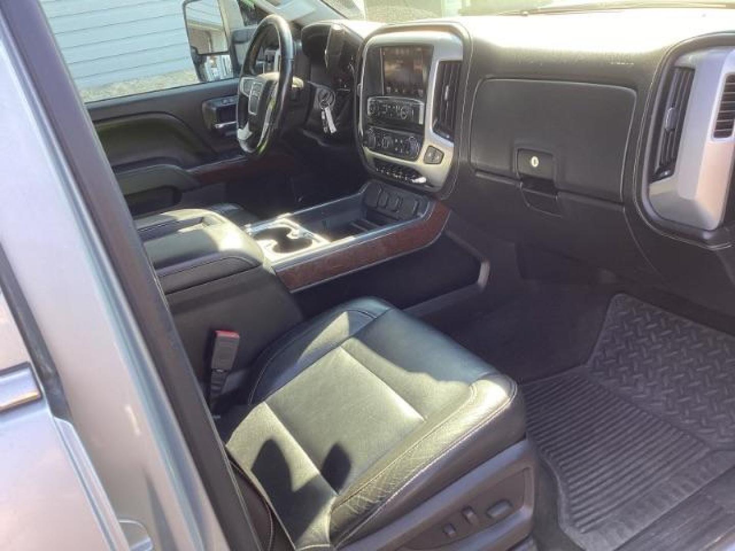 2015 Quicksilver Metallic /Jet Black GMC Sierra 2500HD SLT Crew Cab 4WD (1GT12ZE88FF) with an 6.6L V8 OHV 16V DIESEL engine, 6-Speed Automatic transmission, located at 1235 N Woodruff Ave., Idaho Falls, 83401, (208) 523-1053, 43.507172, -112.000488 - Photo#17