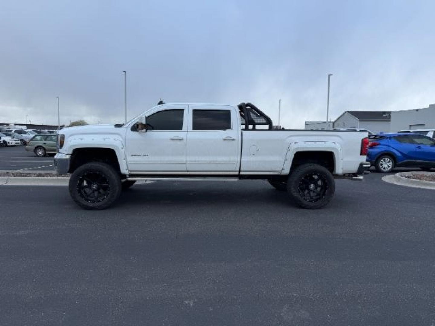 2015 WHITE /Jet Black GMC Sierra 3500HD SLE Crew Cab Long Box 4WD (1GT422CG8FF) with an 6.0L V8 OHV 16V FFV engine, 6-Speed Automatic transmission, located at 1235 N Woodruff Ave., Idaho Falls, 83401, (208) 523-1053, 43.507172, -112.000488 - Photo#1
