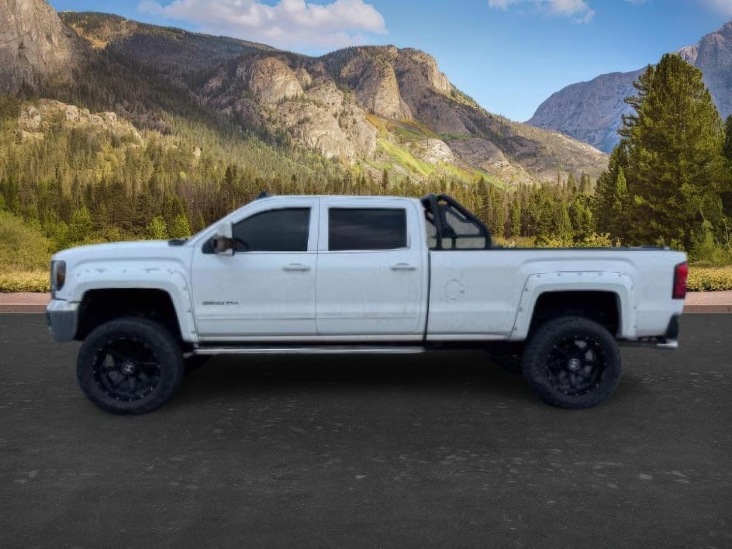 2015 WHITE /Jet Black GMC Sierra 3500HD SLE Crew Cab Long Box 4WD (1GT422CG8FF) with an 6.0L V8 OHV 16V FFV engine, 6-Speed Automatic transmission, located at 1235 N Woodruff Ave., Idaho Falls, 83401, (208) 523-1053, 43.507172, -112.000488 - Photo#0