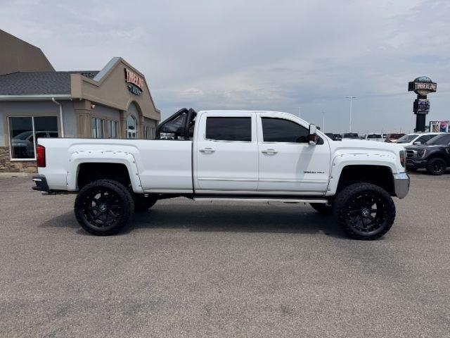 2015 WHITE /Jet Black GMC Sierra 3500HD (1GT422CG8FF) with an 60L V8 OHV 16V FFV engine, Automatic transmission, located at 1175 N Woodruff Ave, Idaho Falls, ID, 83401, 43.506901, -111.999657 - At Timberline Auto, finding a great deal on your next vehicle is always easy! Our experienced sales staff goal is to help find you the right vehicle at the right price! Our knowledgeable finance department has options for almost any credit score. We offer extended service contract options to prot- Photo#34