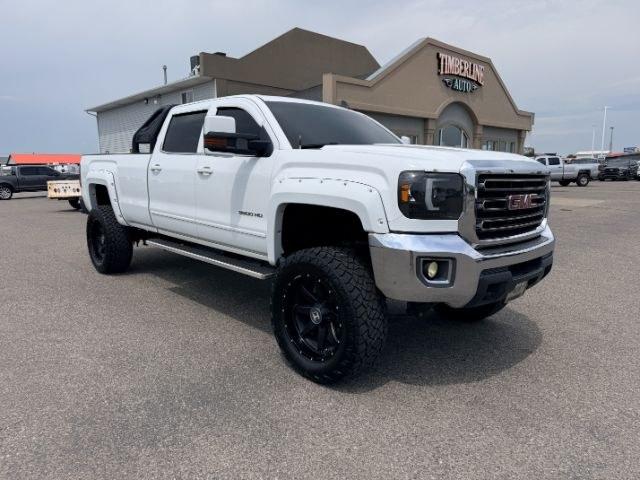 2015 WHITE /Jet Black GMC Sierra 3500HD (1GT422CG8FF) with an 60L V8 OHV 16V FFV engine, Automatic transmission, located at 1175 N Woodruff Ave, Idaho Falls, ID, 83401, 43.506901, -111.999657 - At Timberline Auto, finding a great deal on your next vehicle is always easy! Our experienced sales staff goal is to help find you the right vehicle at the right price! Our knowledgeable finance department has options for almost any credit score. We offer extended service contract options to prot- Photo#35