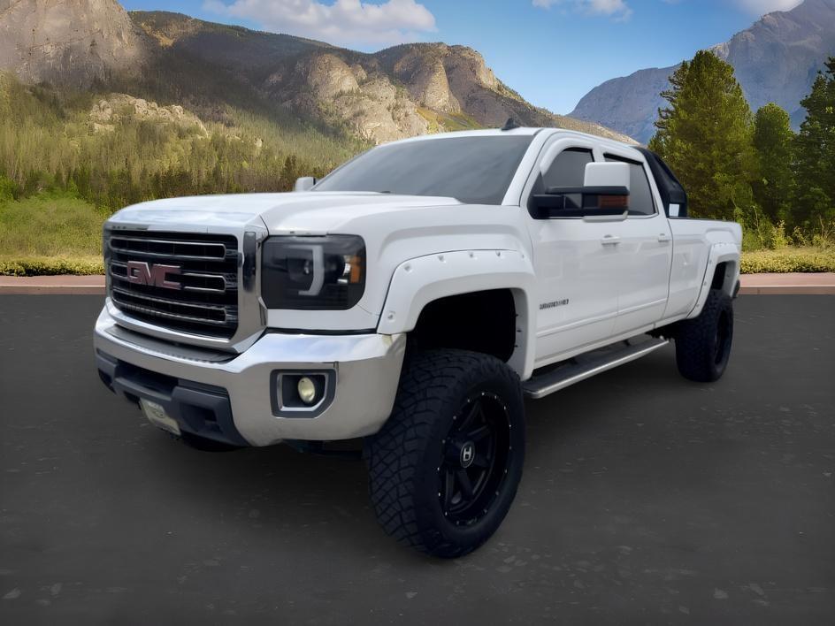 2015 WHITE /Jet Black GMC Sierra 3500HD (1GT422CG8FF) with an 60L V8 OHV 16V FFV engine, Automatic transmission, located at 1175 N Woodruff Ave, Idaho Falls, ID, 83401, 43.506901, -111.999657 - At Timberline Auto, finding a great deal on your next vehicle is always easy! Our experienced sales staff goal is to help find you the right vehicle at the right price! Our knowledgeable finance department has options for almost any credit score. We offer extended service contract options to prot- Photo#0