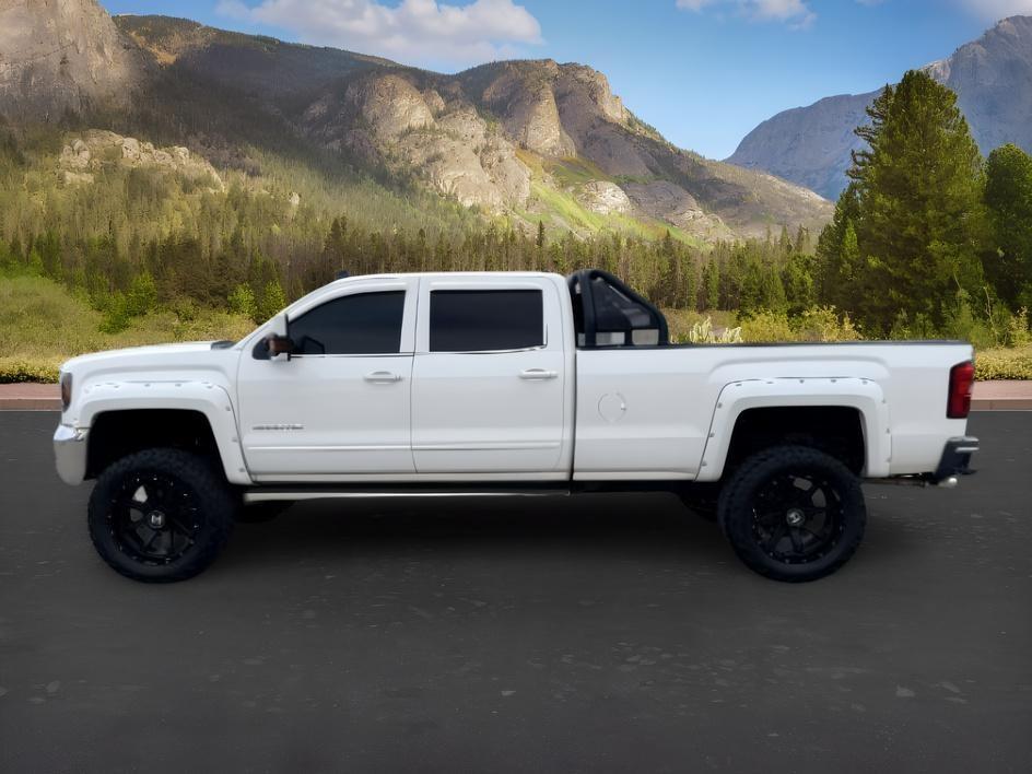 2015 WHITE /Jet Black GMC Sierra 3500HD (1GT422CG8FF) with an 60L V8 OHV 16V FFV engine, Automatic transmission, located at 1175 N Woodruff Ave, Idaho Falls, ID, 83401, 43.506901, -111.999657 - At Timberline Auto, finding a great deal on your next vehicle is always easy! Our experienced sales staff goal is to help find you the right vehicle at the right price! Our knowledgeable finance department has options for almost any credit score. We offer extended service contract options to prot- Photo#1
