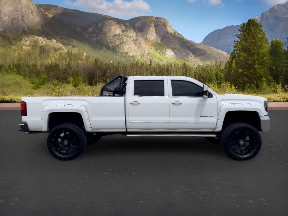 2015 WHITE /Jet Black GMC Sierra 3500HD (1GT422CG8FF) with an 60L V8 OHV 16V FFV engine, Automatic transmission, located at 1175 N Woodruff Ave, Idaho Falls, ID, 83401, 43.506901, -111.999657 - At Timberline Auto, finding a great deal on your next vehicle is always easy! Our experienced sales staff goal is to help find you the right vehicle at the right price! Our knowledgeable finance department has options for almost any credit score. We offer extended service contract options to prot- Photo#7