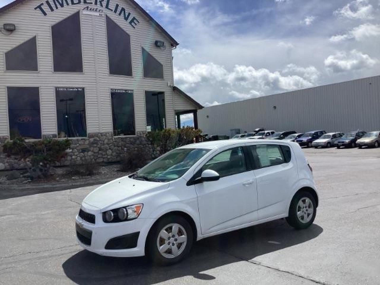 2016 Summit White Chevrolet Sonic LS Auto 5-Door (1G1JA6SH6G4) with an 1.8L L4 DOHC 24V engine, 6-Speed Automatic transmission, located at 1235 N Woodruff Ave., Idaho Falls, 83401, (208) 523-1053, 43.507172, -112.000488 - Photo #0