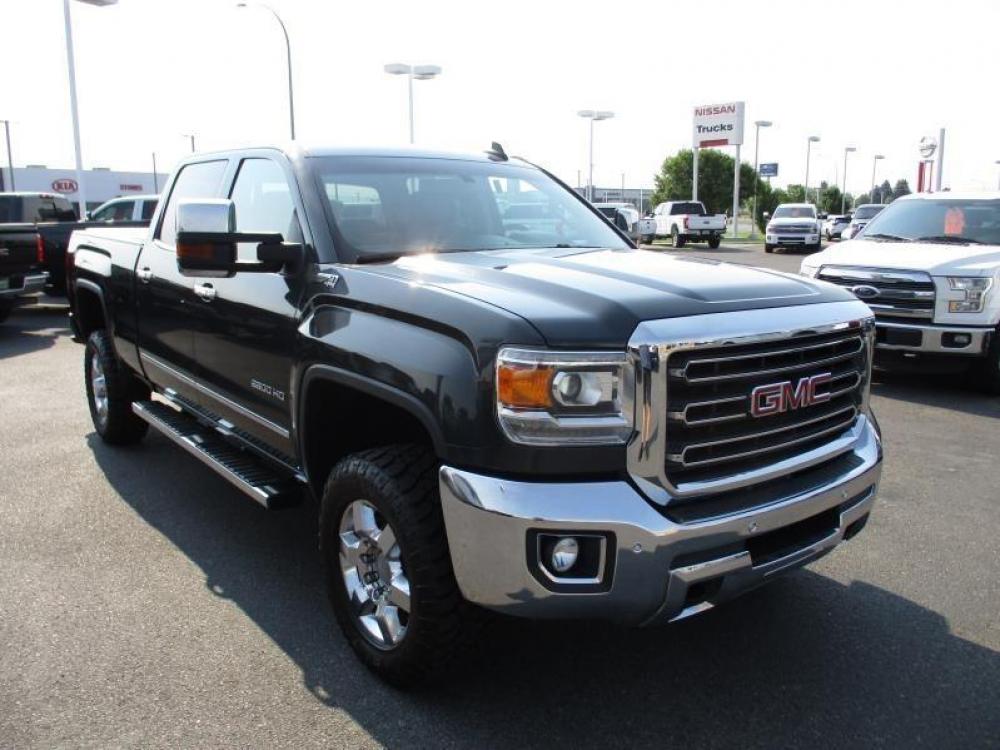 2017 GRAY /BLACK GMC SIERRA 2500 SLT (1GT12TEG6HF) with an 8 engine, Automatic transmission, located at 1580 E Lincoln Rd, Idaho Falls, ID, 83401, (208) 523-4000, 0.000000, 0.000000 - 6.0L VORTEC- 4WD- SHORT BED- DRIVEN 103,081 MILES- LEATHER INTERIOR. 2017 GMC 2500 SLT Z71. Great body, clean paint, spotless interior, and good miles. Equipped with fixed running boards, tow mirrors, bed liner, and tonneua cover. Sit back and enjoy this trucks heated seats and heated steering w - Photo #9