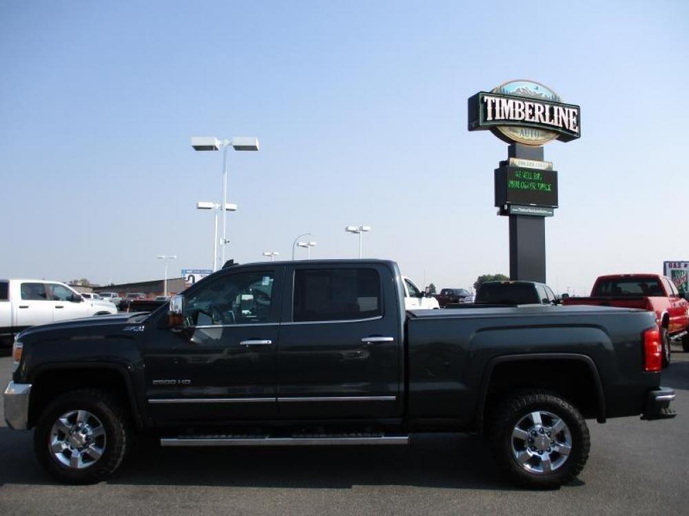 2017 GRAY /BLACK GMC SIERRA 2500 SLT (1GT12TEG6HF) with an 8 engine, Automatic transmission, located at 1580 E Lincoln Rd, Idaho Falls, ID, 83401, (208) 523-4000, 0.000000, 0.000000 - 6.0L VORTEC- 4WD- SHORT BED- DRIVEN 103,081 MILES- LEATHER INTERIOR. 2017 GMC 2500 SLT Z71. Great body, clean paint, spotless interior, and good miles. Equipped with fixed running boards, tow mirrors, bed liner, and tonneua cover. Sit back and enjoy this trucks heated seats and heated steering w - Photo #2