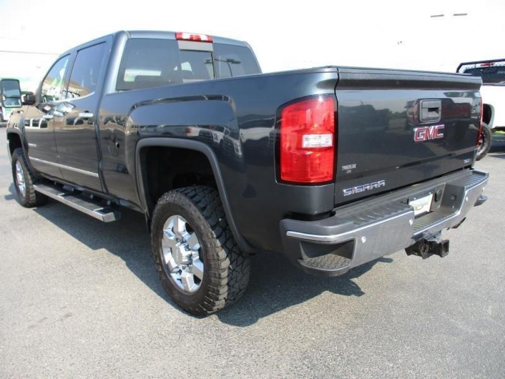 2017 GRAY /BLACK GMC SIERRA 2500 SLT (1GT12TEG6HF) with an 8 engine, Automatic transmission, located at 1580 E Lincoln Rd, Idaho Falls, ID, 83401, (208) 523-4000, 0.000000, 0.000000 - 6.0L VORTEC- 4WD- SHORT BED- DRIVEN 103,081 MILES- LEATHER INTERIOR. 2017 GMC 2500 SLT Z71. Great body, clean paint, spotless interior, and good miles. Equipped with fixed running boards, tow mirrors, bed liner, and tonneua cover. Sit back and enjoy this trucks heated seats and heated steering w - Photo #4