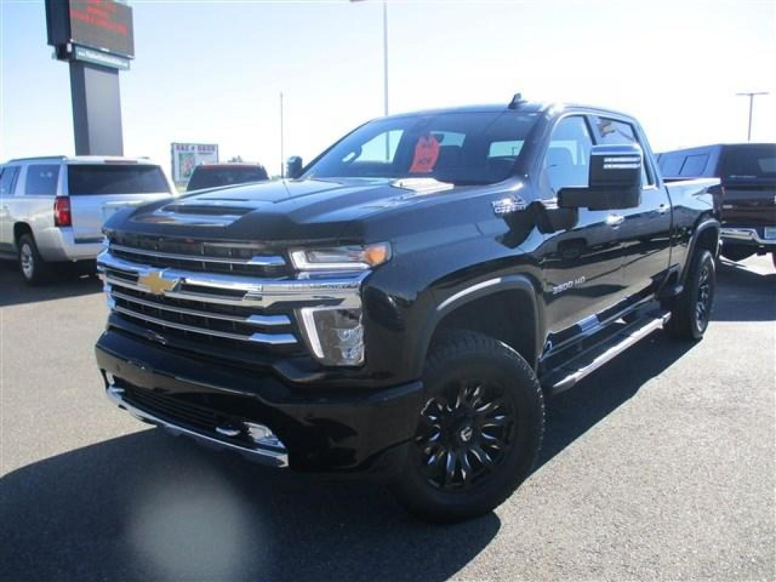 2022 BLACK /BLACK CHEVROLET SILVERADO 3500 HIGH COUNTRY (1GC4YVEY5NF) with an 8 engine, Automatic transmission, located at 1235 N Woodruff Ave., Idaho Falls, 83401, (208) 523-1053, 43.507172, -112.000488 - 20 INCH FUEL BLITZ WRAPPED IN 35 INCH DYNAPRO AT2'S WITH 90% TREAD. HIGH COUNTRY PACKAGE. POWER EXTEND/FOLD MIRRORS. 360 DEGREE CAMERA. DIGITAL REAR VIEW MIRROR. MECHANICALLY STOCK. STOCK SUSPENSION. FACTORY 5TH WHEEL PUCK SYSTEM. HEATED AND COOLED SEATS. SUNROOF. ANROID AUTO AND APPLE CAR PLAY. 6. - Photo #1