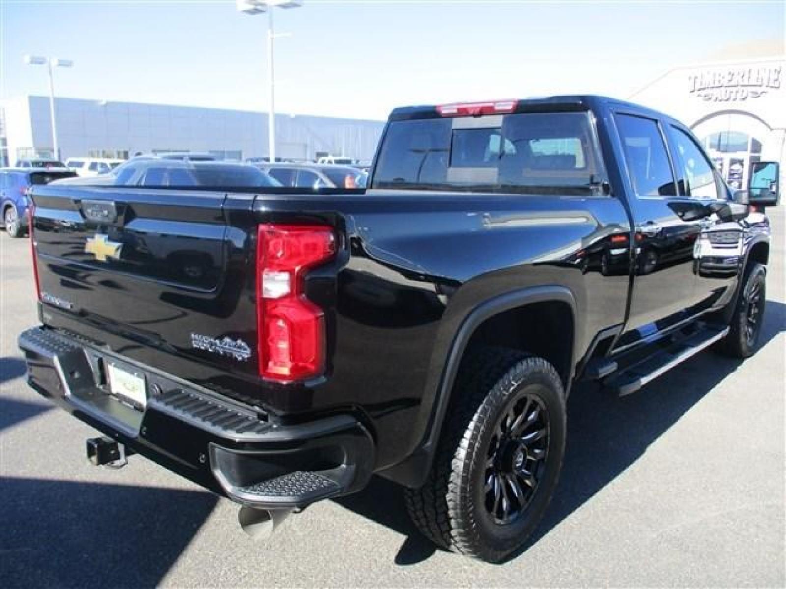 2022 BLACK /BLACK CHEVROLET SILVERADO 3500 HIGH COUNTRY (1GC4YVEY5NF) with an 8 engine, Automatic transmission, located at 1235 N Woodruff Ave., Idaho Falls, 83401, (208) 523-1053, 43.507172, -112.000488 - 20 INCH FUEL BLITZ WRAPPED IN 35 INCH DYNAPRO AT2'S WITH 90% TREAD. HIGH COUNTRY PACKAGE. POWER EXTEND/FOLD MIRRORS. 360 DEGREE CAMERA. DIGITAL REAR VIEW MIRROR. MECHANICALLY STOCK. STOCK SUSPENSION. FACTORY 5TH WHEEL PUCK SYSTEM. HEATED AND COOLED SEATS. SUNROOF. ANROID AUTO AND APPLE CAR PLAY. 6. - Photo #5