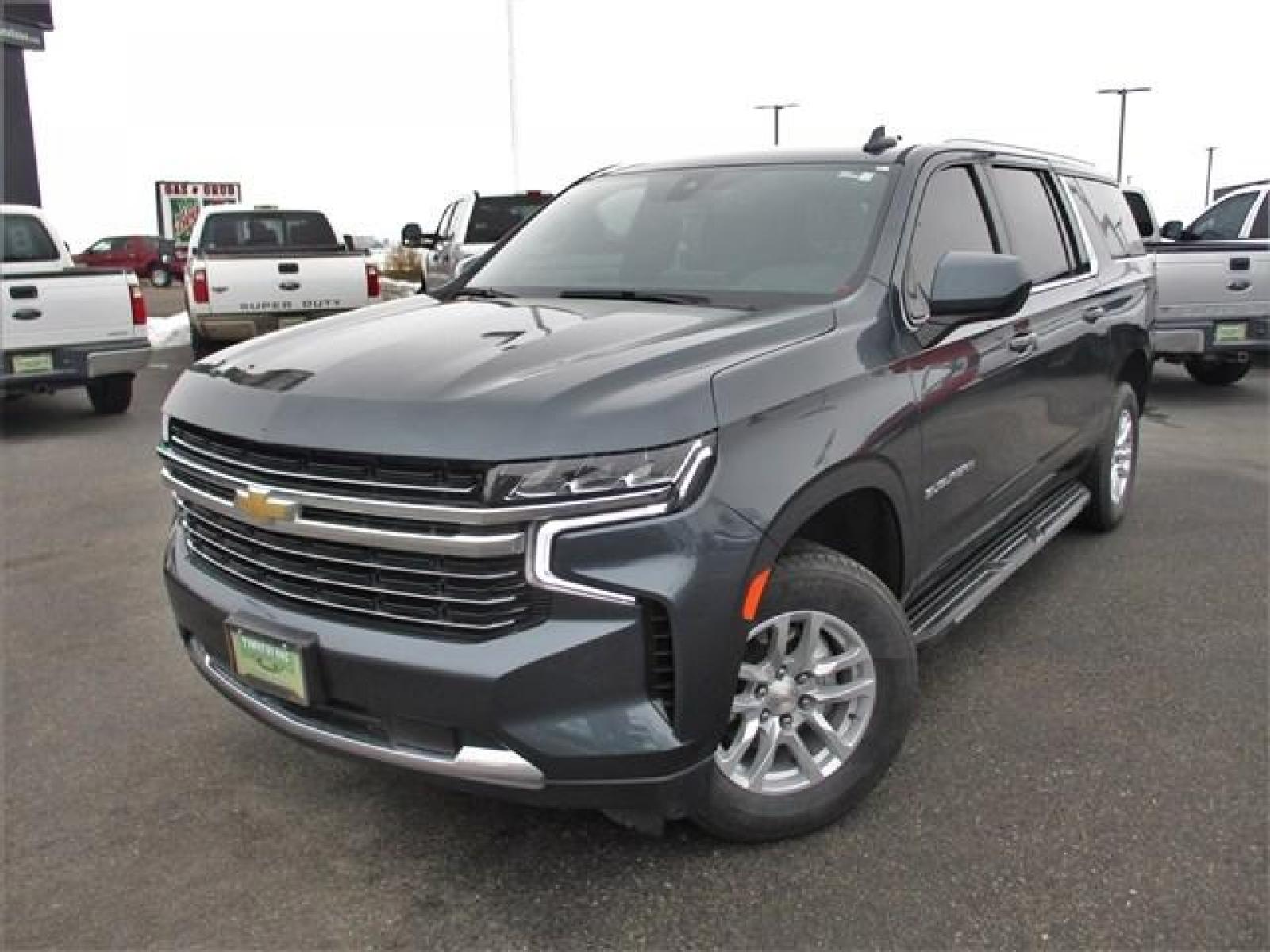 2021 GRAY /BLACK CHEVROLET SUBURBAN LT (1GNSKCKDXMR) with an 8 engine, Automatic transmission, located at 1580 E Lincoln Rd, Idaho Falls, ID, 83401, (208) 523-4000, 0.000000, 0.000000 - -HARD TO FIND NEW BODY SUBURBAN- AWESOME SLATE GREY/BLUE PAINT COLOR. BODY, PAINT, AND INTERIOR ARE IN PRESTINE CONDITION. DUAL POWER SEATS. LARGE INFOTAINMENT SCREEN. ADJUSTABLE REAR CAPTAIIN SEATS. POWER LIFTGATE. REAR CLIMATE CONTROL. REMOTE START. REMOTE LIFTGATE. WIRELESS CHARGING. HEATED SEATS - Photo #1