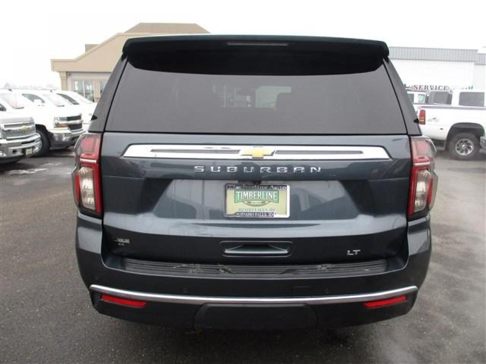 2021 GRAY /BLACK CHEVROLET SUBURBAN LT (1GNSKCKDXMR) with an 8 engine, Automatic transmission, located at 1235 N Woodruff Ave., Idaho Falls, 83401, (208) 523-1053, 43.507172, -112.000488 - -HARD TO FIND NEW BODY SUBURBAN- AWESOME SLATE GREY/BLUE PAINT COLOR. BODY, PAINT, AND INTERIOR ARE IN PRESTINE CONDITION. DUAL POWER SEATS. LARGE INFOTAINMENT SCREEN. ADJUSTABLE REAR CAPTAIIN SEATS. POWER LIFTGATE. REAR CLIMATE CONTROL. REMOTE START. REMOTE LIFTGATE. WIRELESS CHARGING. HEATED SEATS - Photo #5