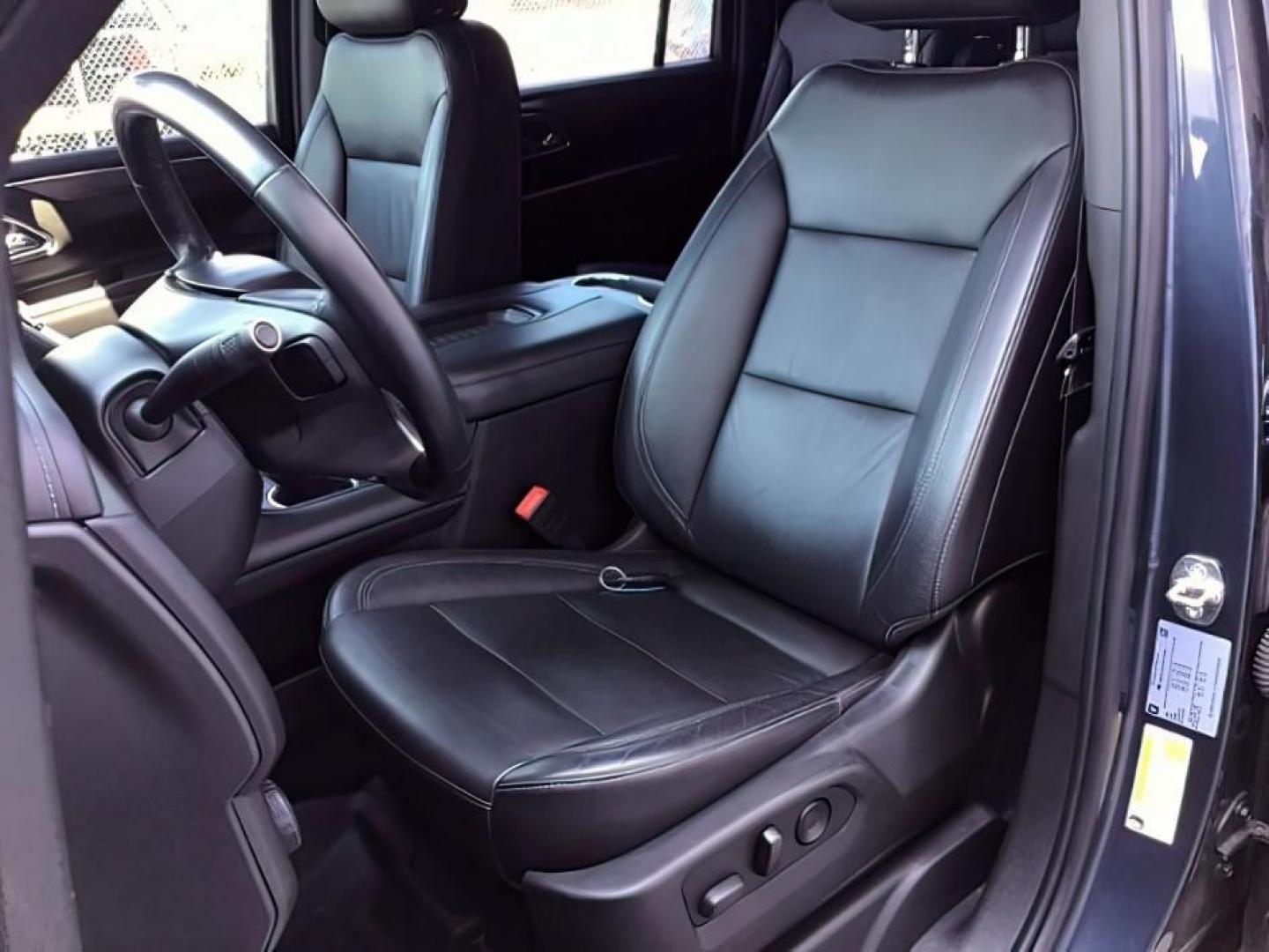 2021 GRAY /BLACK Chevrolet Suburban LT 4WD (1GNSKCKDXMR) with an 5.3L V8 OHV 16V engine, 10-Speed Automatic transmission, located at 1235 N Woodruff Ave., Idaho Falls, 83401, (208) 523-1053, 43.507172, -112.000488 - Hard to find late model Carry-All with low miles! It comes with heated seats, back up camera, parking sensors, collision avoidance, auto start/stop (to save on fuel), power folding mirrors, BOSE premium sound, and many, many more options! At Timberline Auto it is always easy to find a great deal - Photo#12