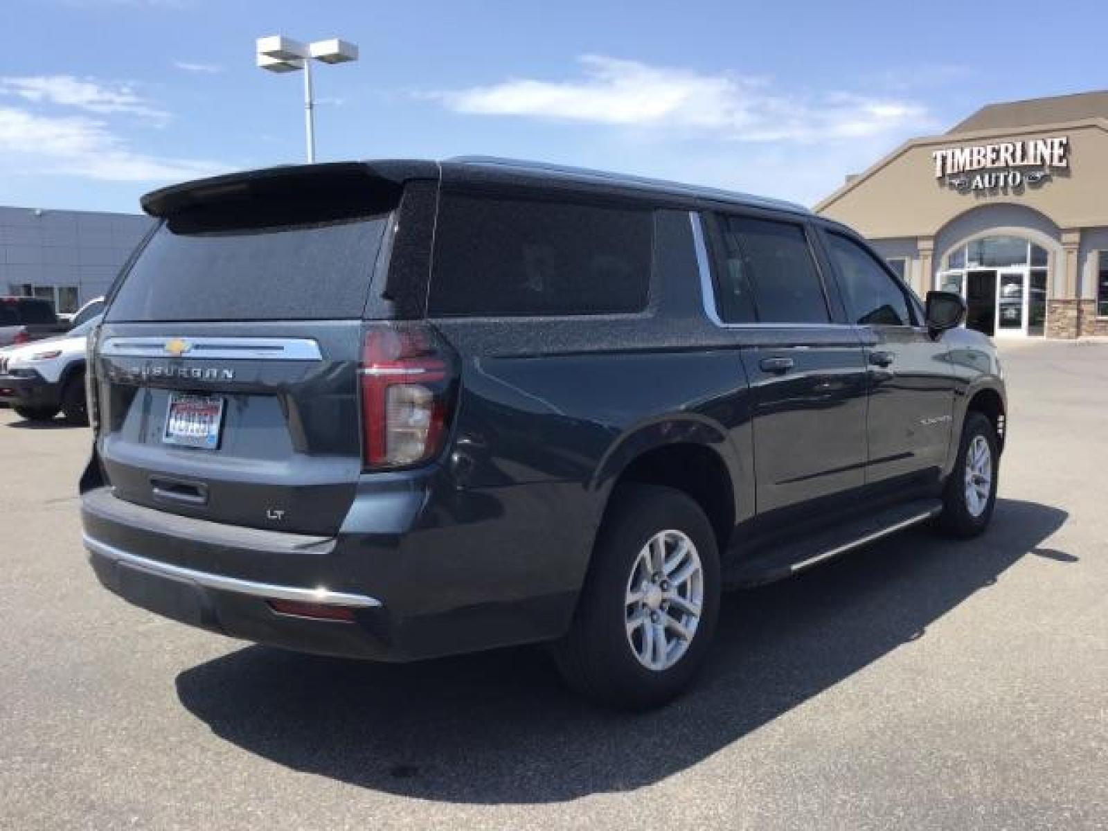 2021 GRAY /BLACK Chevrolet Suburban LT 4WD (1GNSKCKDXMR) with an 5.3L V8 OHV 16V engine, 10-Speed Automatic transmission, located at 1235 N Woodruff Ave., Idaho Falls, 83401, (208) 523-1053, 43.507172, -112.000488 - Photo #5