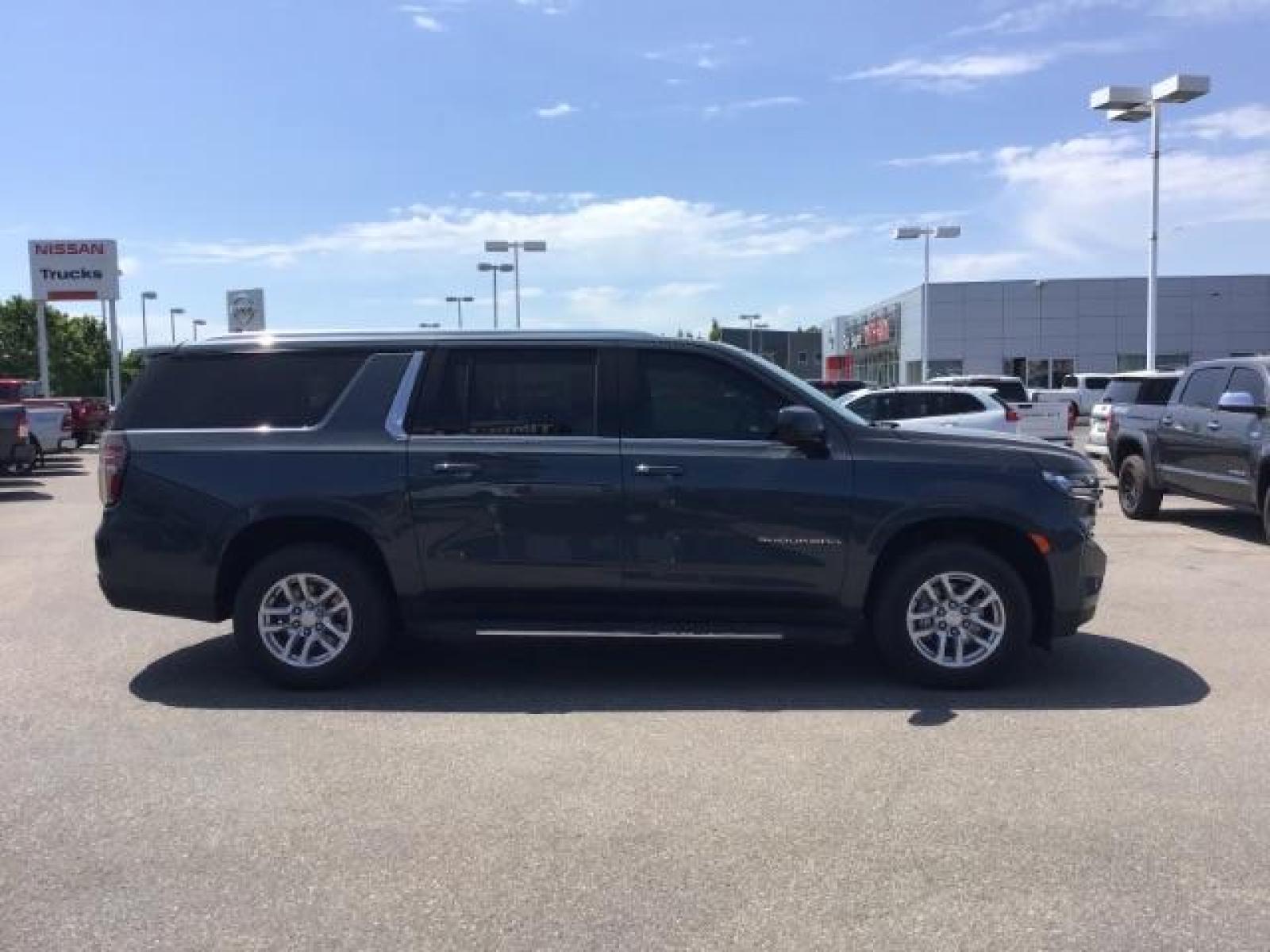 2021 GRAY /BLACK Chevrolet Suburban LT 4WD (1GNSKCKDXMR) with an 5.3L V8 OHV 16V engine, 10-Speed Automatic transmission, located at 1235 N Woodruff Ave., Idaho Falls, 83401, (208) 523-1053, 43.507172, -112.000488 - Photo #6