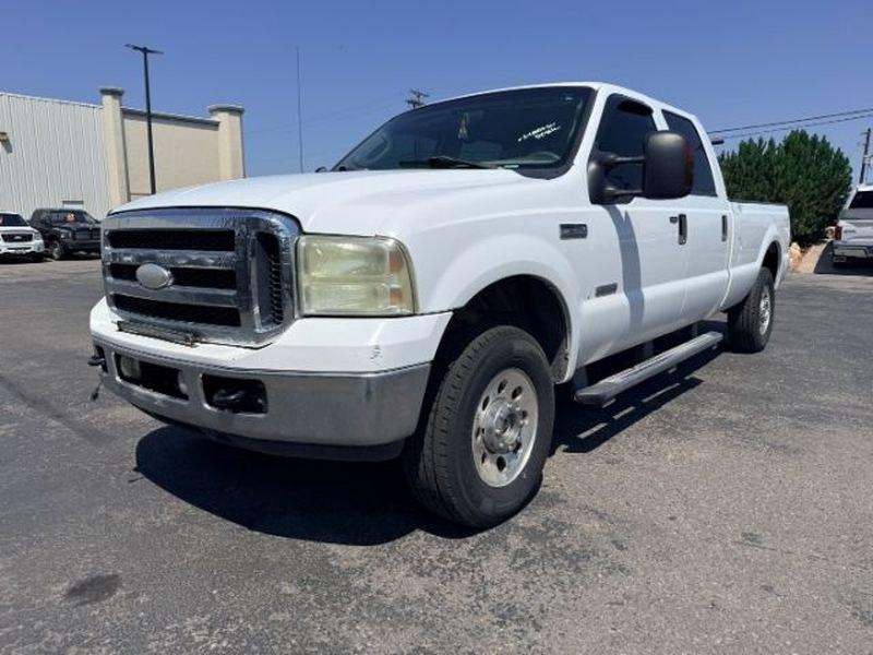2006 Oxford White Clearcoat /Medium Flint Ford F-250 XLT (1FTSW21P56E) with an V8, 6.0L engine, 5-speed automatic transmission, located at 1175 N Woodruff Ave, Idaho Falls, ID, 83401, 43.506901, -111.999657 - <b>Vehicle Details</b><br>This 2006 Ford F-250 Super Duty XL XLT LARIAT is a rugged heavy-duty pickup built for serious towing, hauling, and everyday confidence. Equipped with 4WD and a V8 6.0L Diesel engine, this Super Duty delivers the power and capability drivers expect from a proven Ford truck.- Photo#0