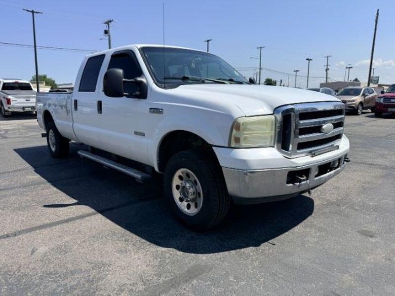 2006 Oxford White Clearcoat /Medium Flint Ford F-250 XLT (1FTSW21P56E) with an V8, 6.0L engine, 5-speed automatic transmission, located at 1175 N Woodruff Ave, Idaho Falls, ID, 83401, 43.506901, -111.999657 - <b>Vehicle Details</b><br>This 2006 Ford F-250 Super Duty XL XLT LARIAT is a rugged heavy-duty pickup built for serious towing, hauling, and everyday confidence. Equipped with 4WD and a V8 6.0L Diesel engine, this Super Duty delivers the power and capability drivers expect from a proven Ford truck.- Photo#6